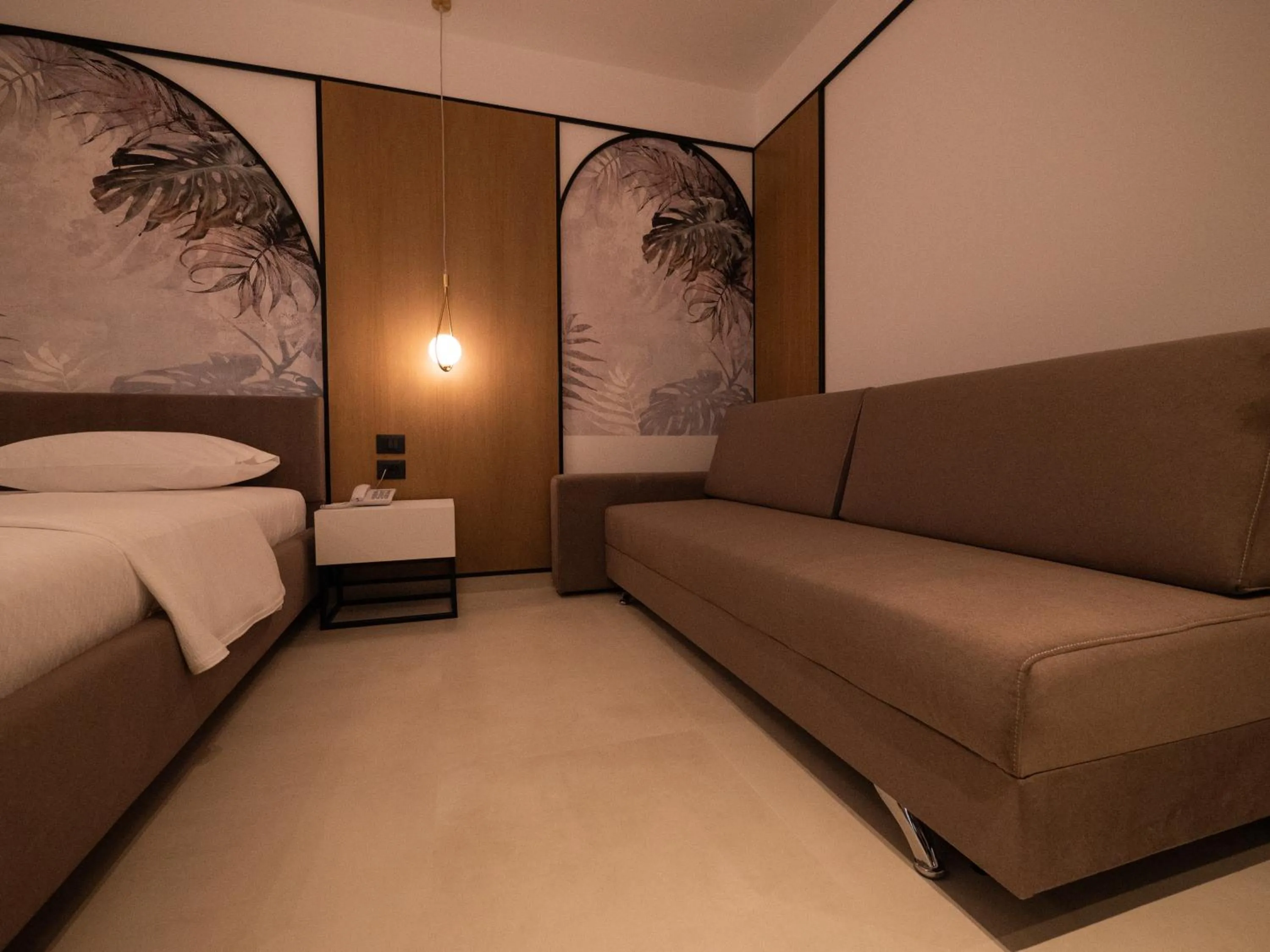 Bed in Colosseum Hotel