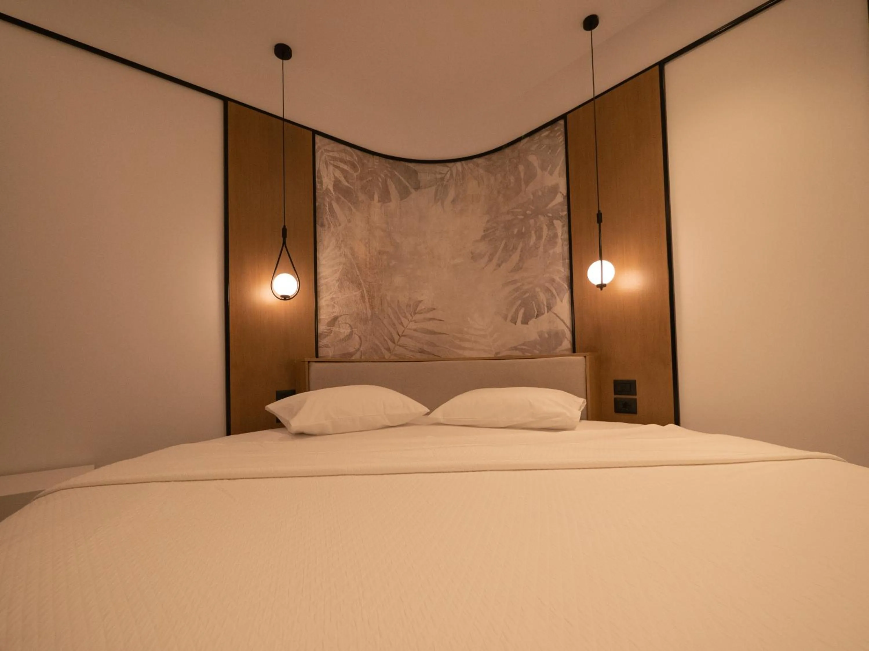 Bed in Colosseum Hotel