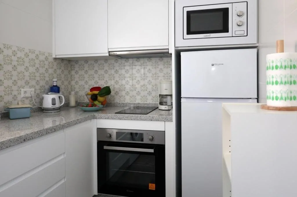 Kitchen or kitchenette in Sea Front Apartment in La Cala de Mijas