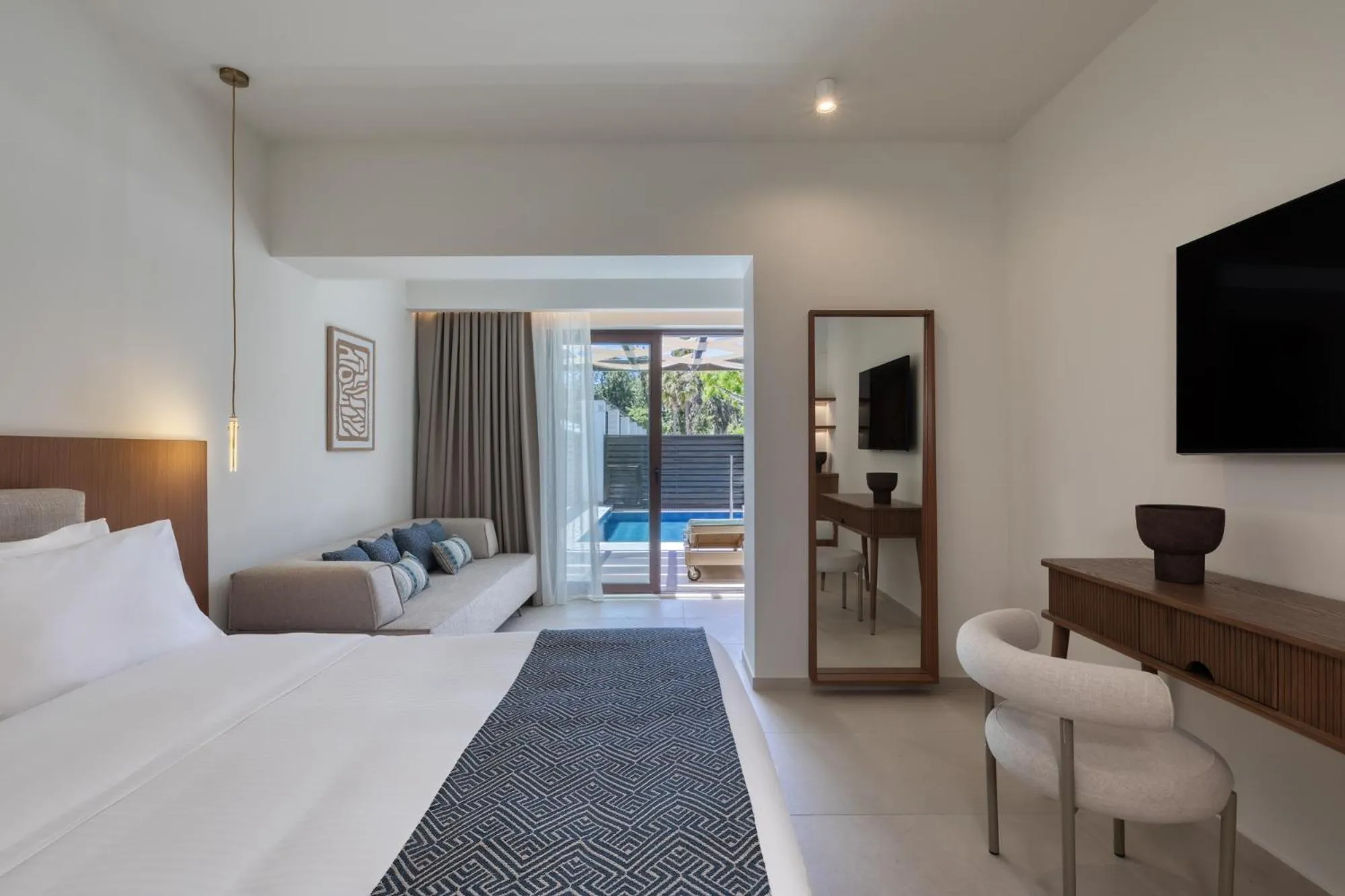 Seating area, Bed in Oceanis Beach & Spa Resort