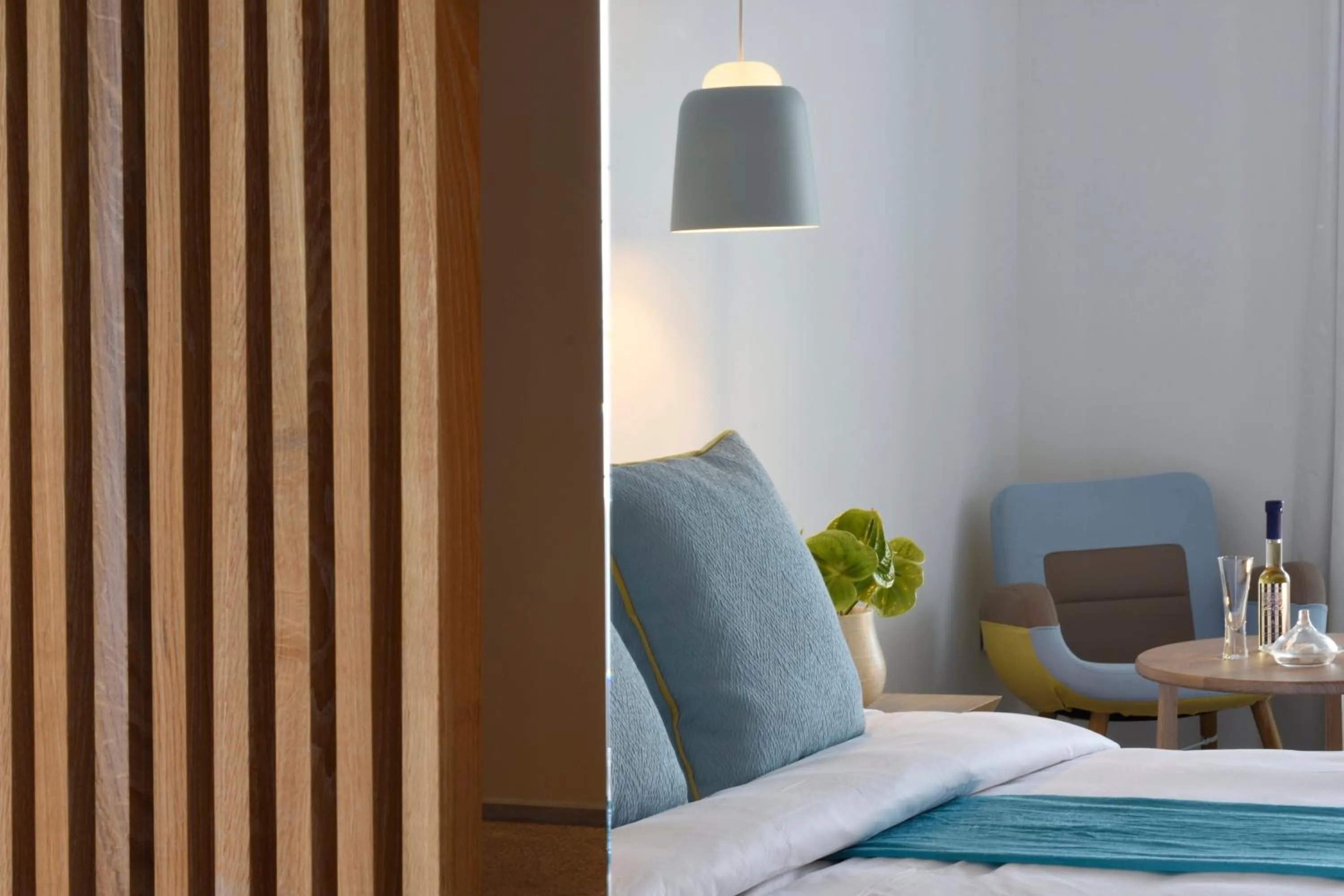 Bed in Myconian Korali Relais & Chateaux