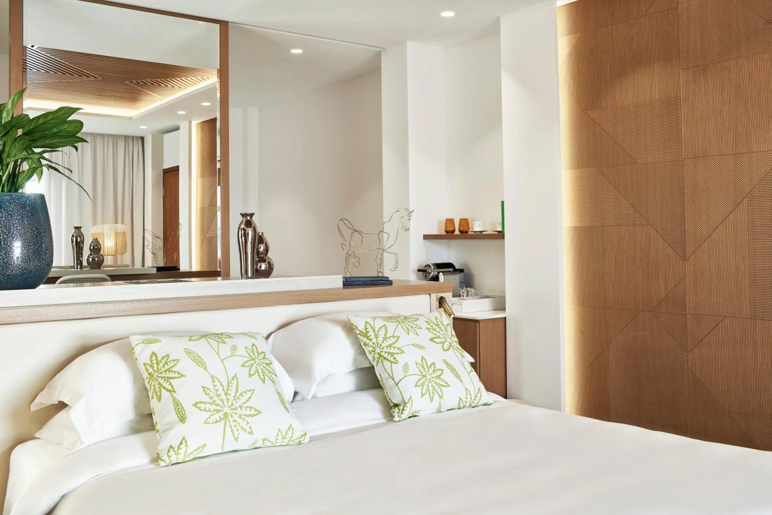 Bed in Myconian Korali Relais & Chateaux