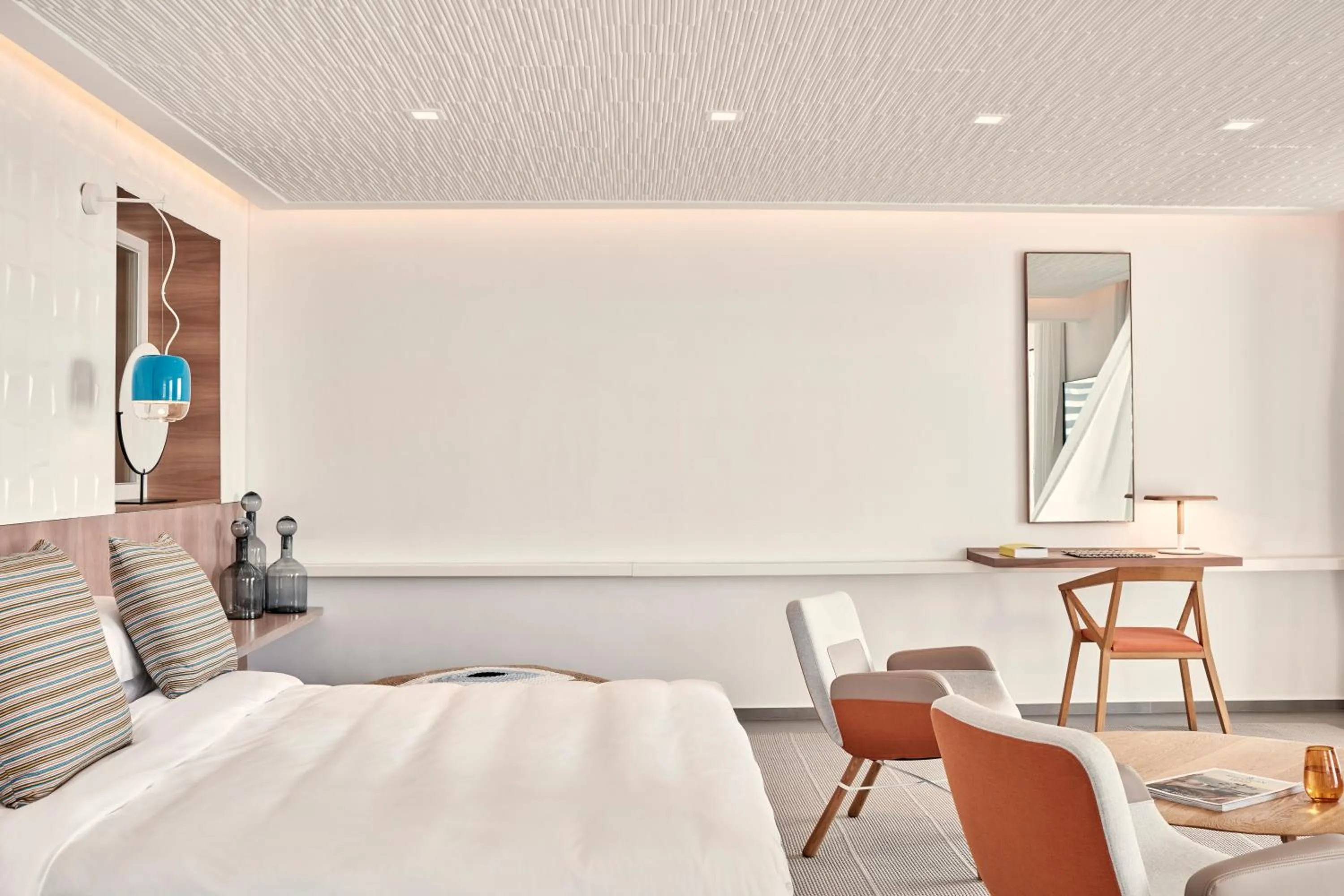 Bedroom in Myconian Korali Relais & Chateaux