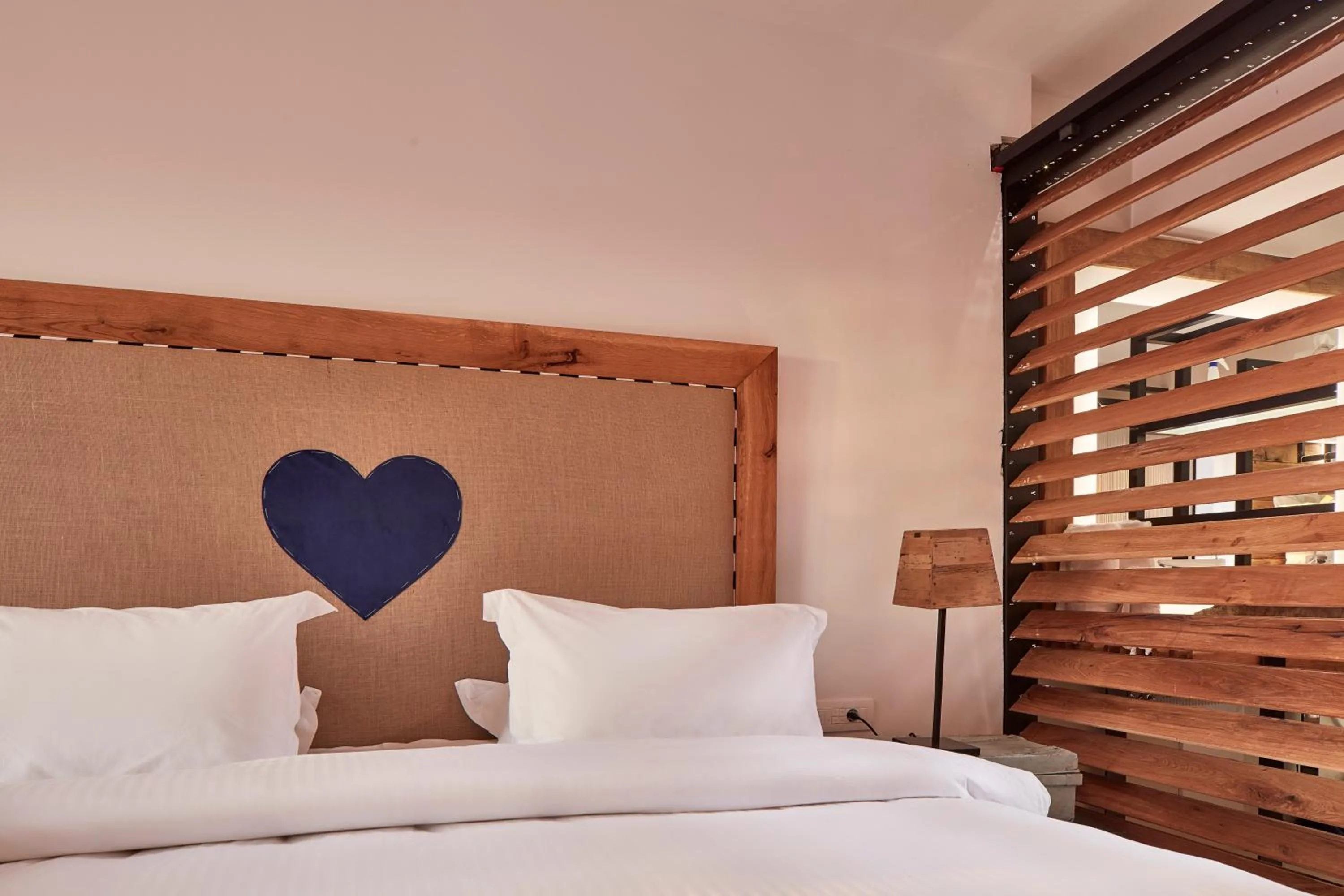 Bed in Myconian Imperial - Leading Hotels of the World