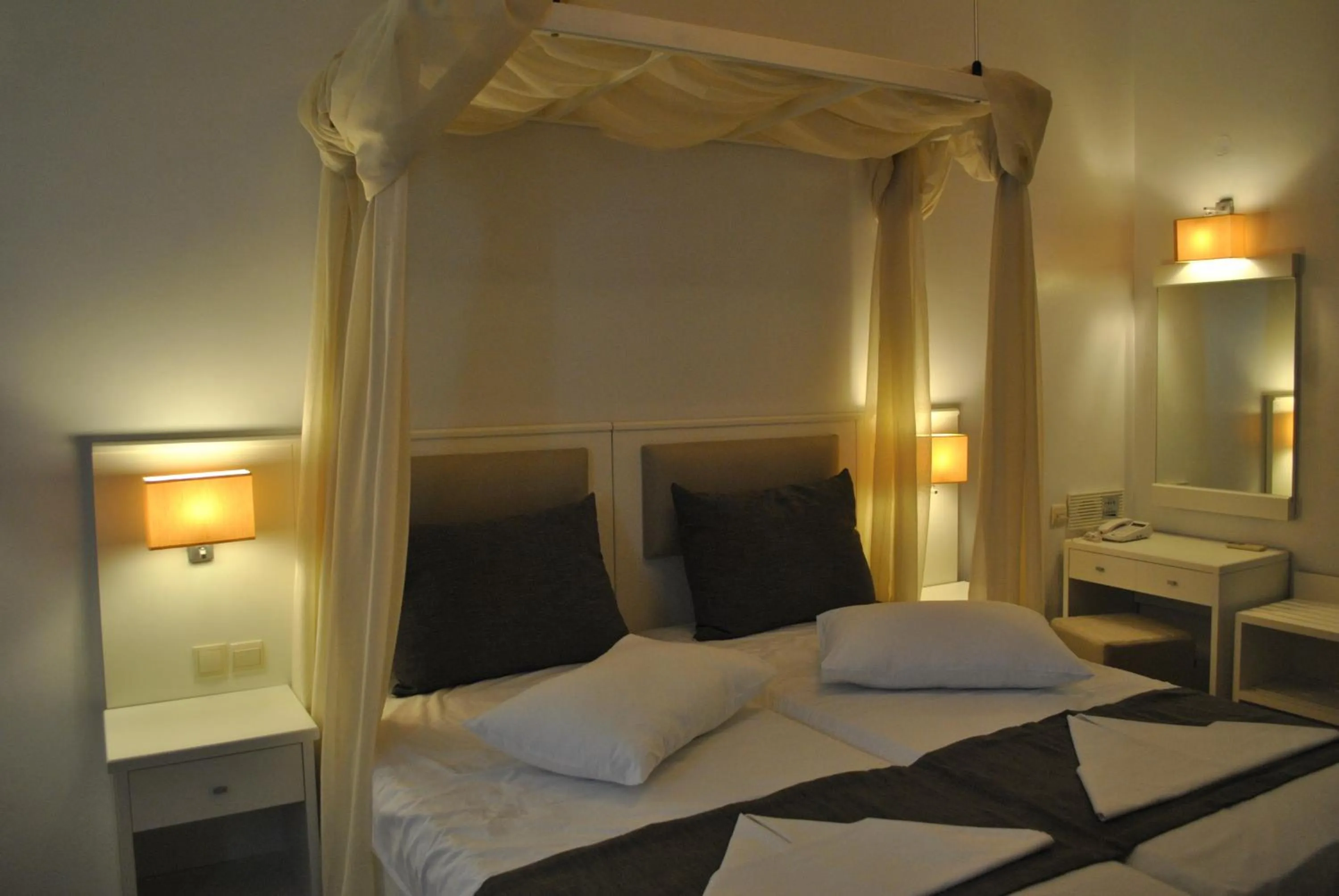Bed in Mirini Hotel