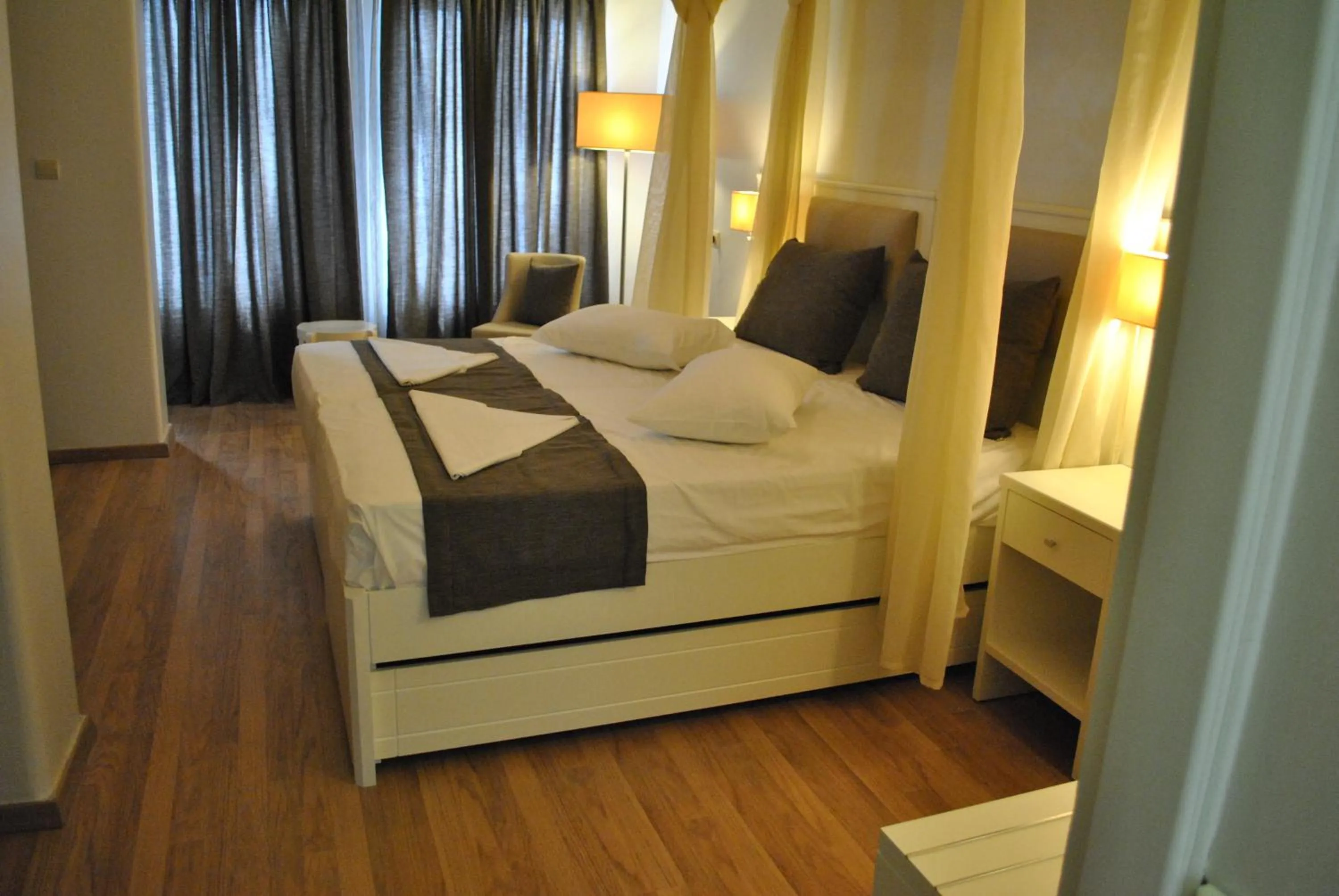Bed in Mirini Hotel