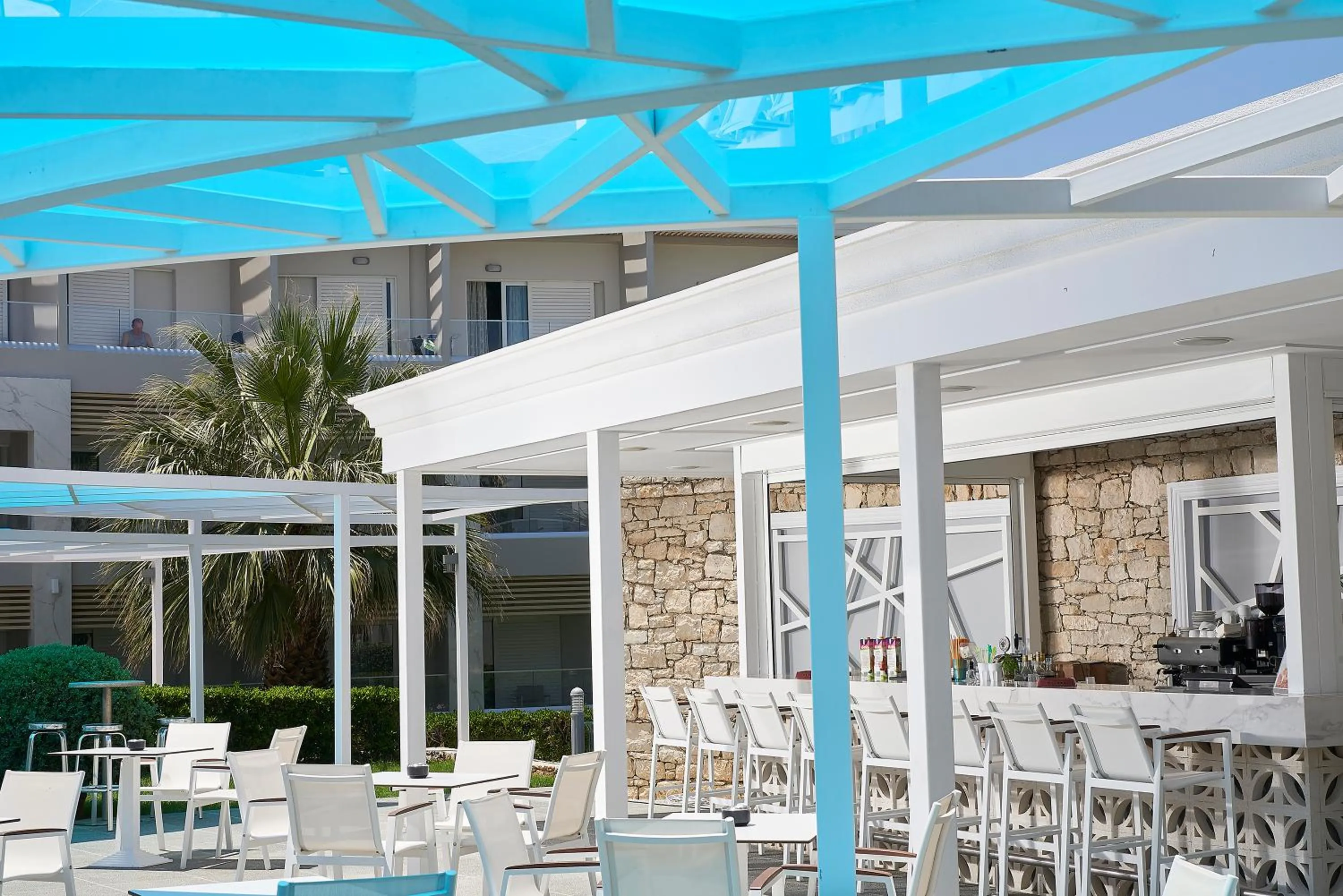 Lounge or bar in Mythos Palace Resort & Spa