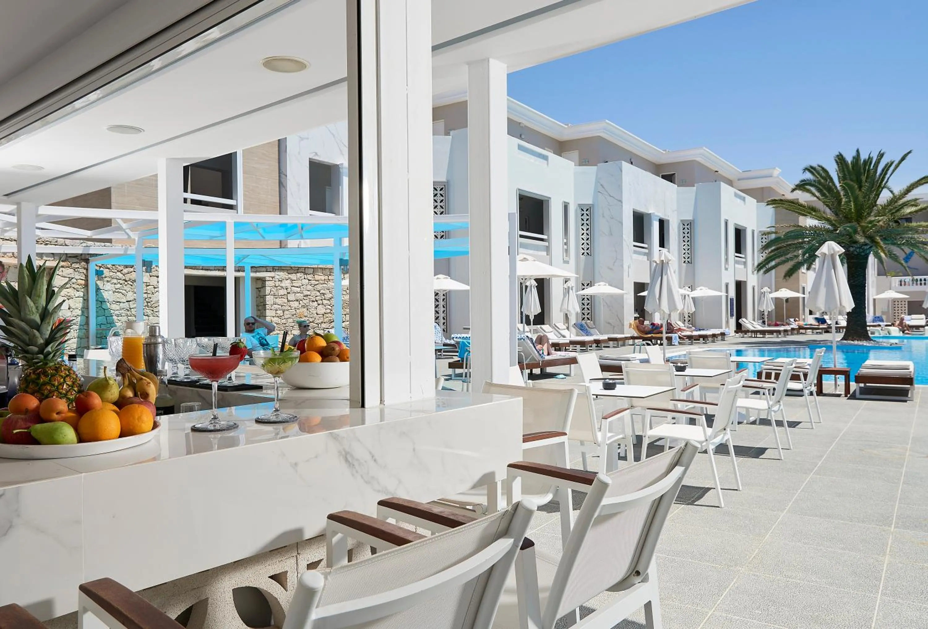 Lounge or bar in Mythos Palace Resort & Spa