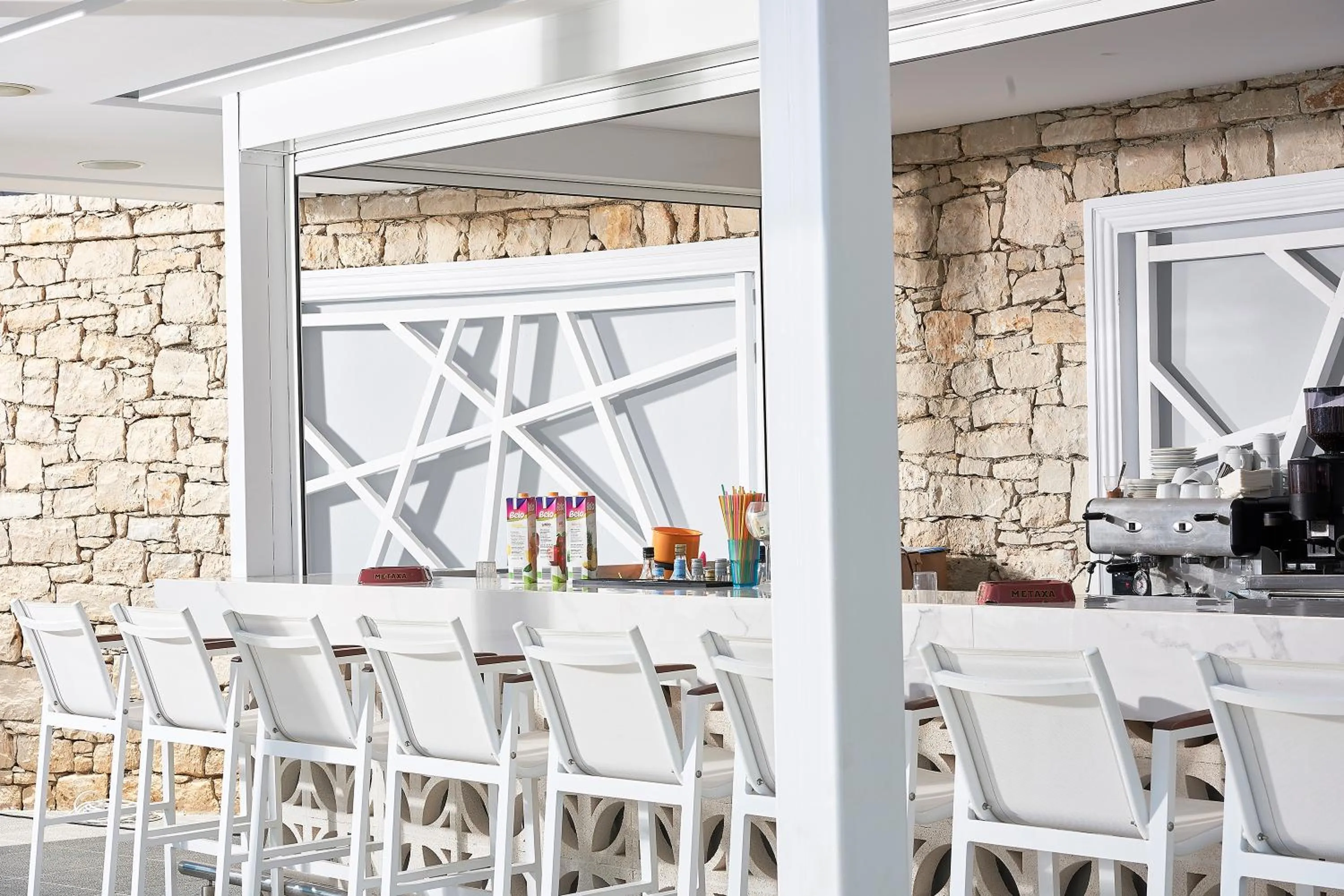 Lounge or bar in Mythos Palace Resort & Spa