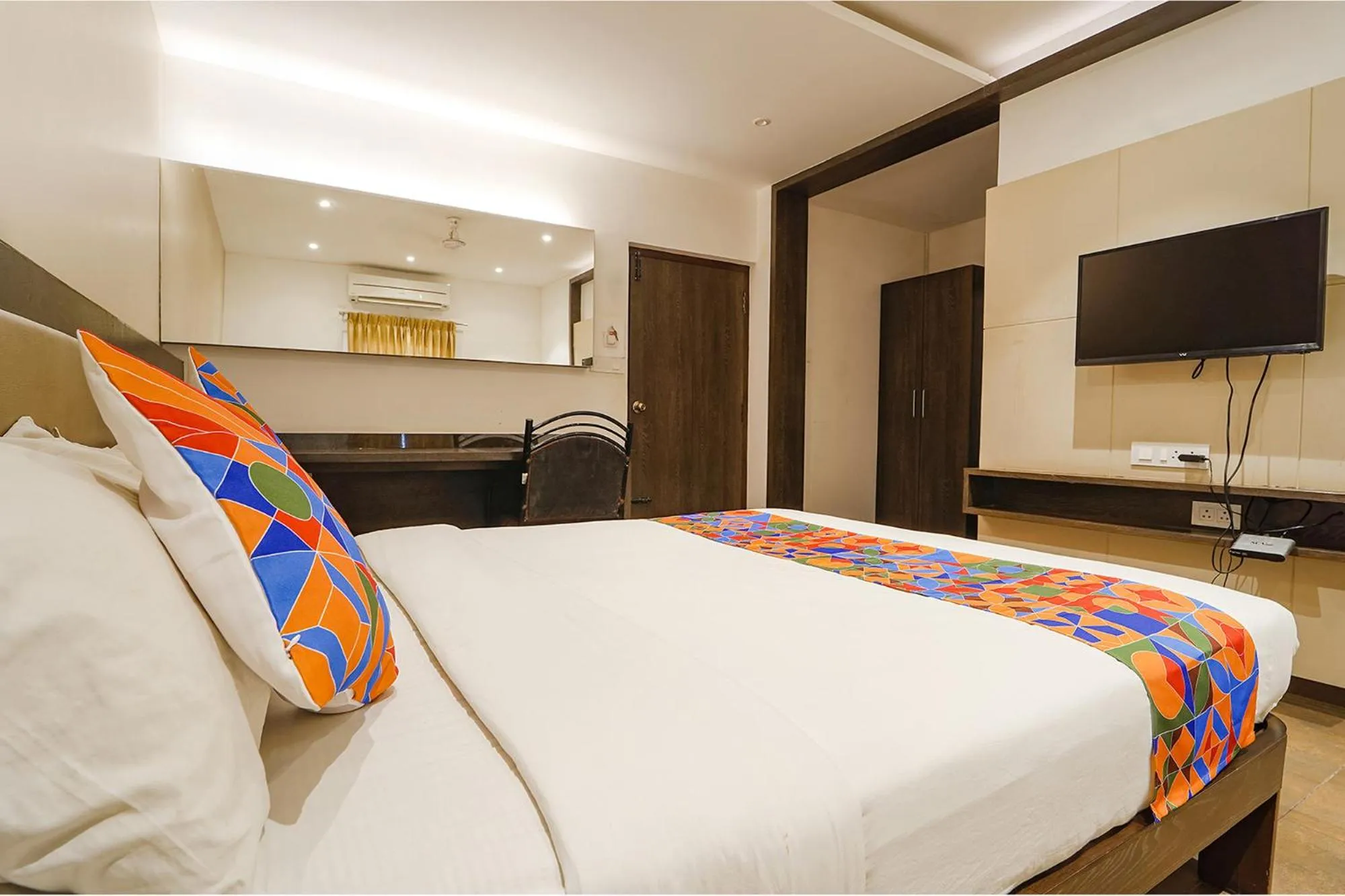 Bed in FabHotel Karpagam - 900m from Nehru Stadium