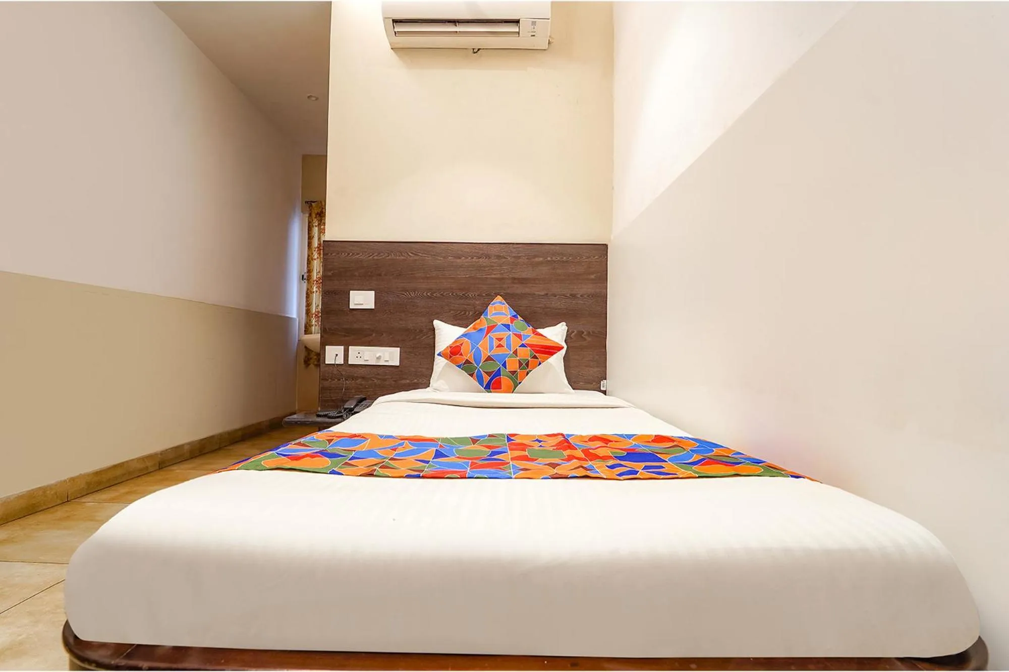 Bed in FabHotel Karpagam - 900m from Nehru Stadium