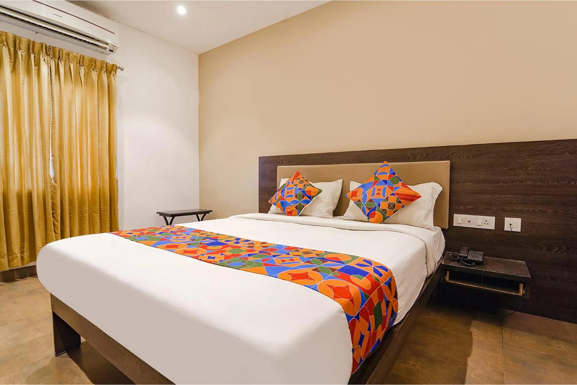 Bed in FabHotel Karpagam - 900m from Nehru Stadium