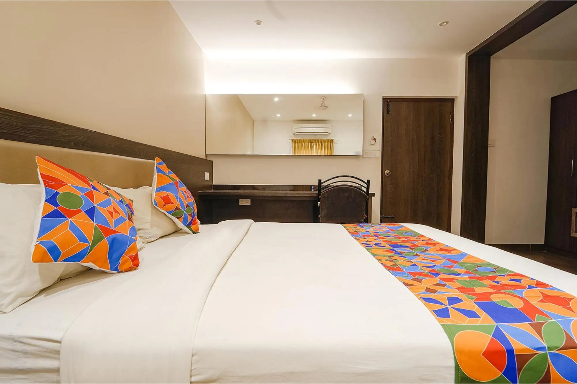 Bed in FabHotel Karpagam - 900m from Nehru Stadium