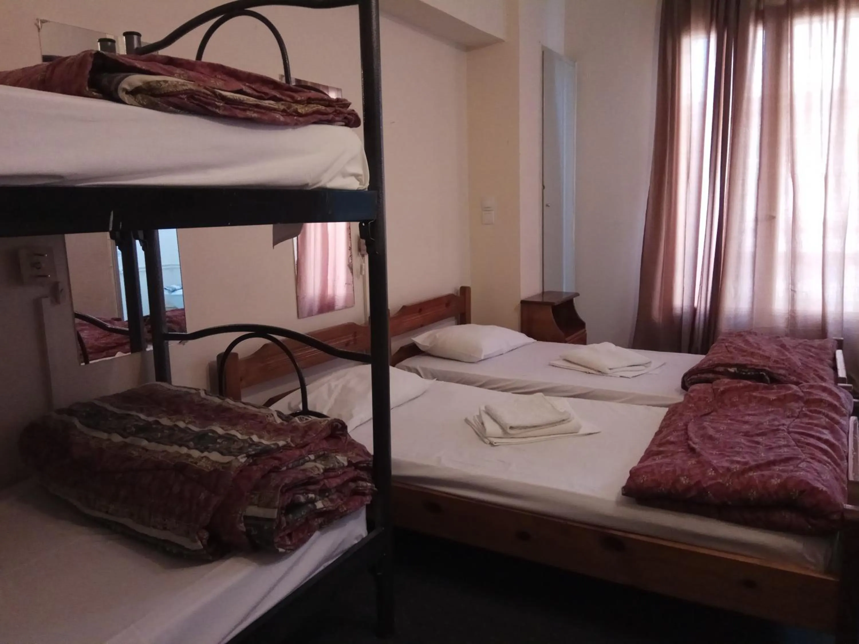 Bed in Delfini Hotel