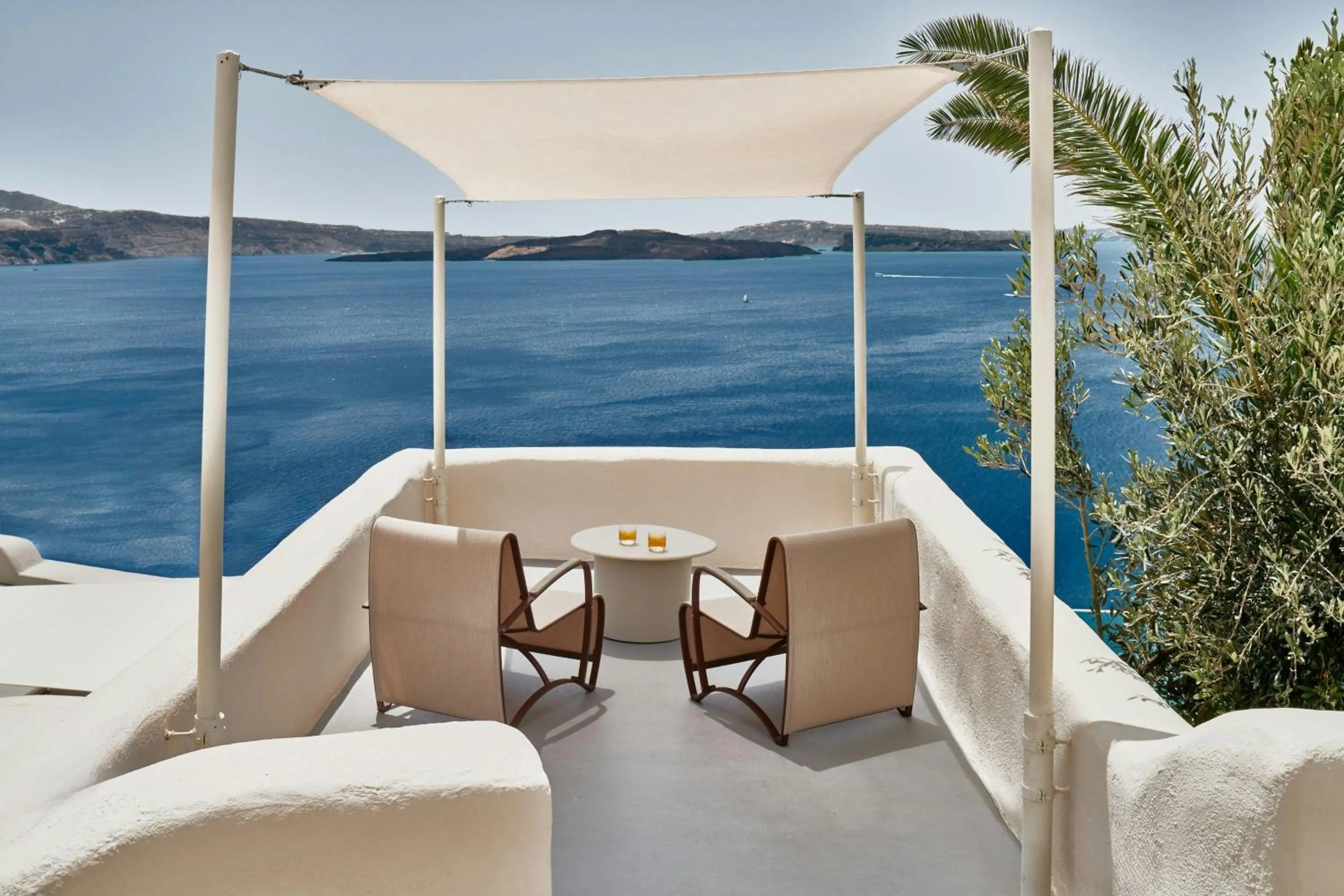 Photo of the whole room in Mystique, a Luxury Collection Hotel, Santorini