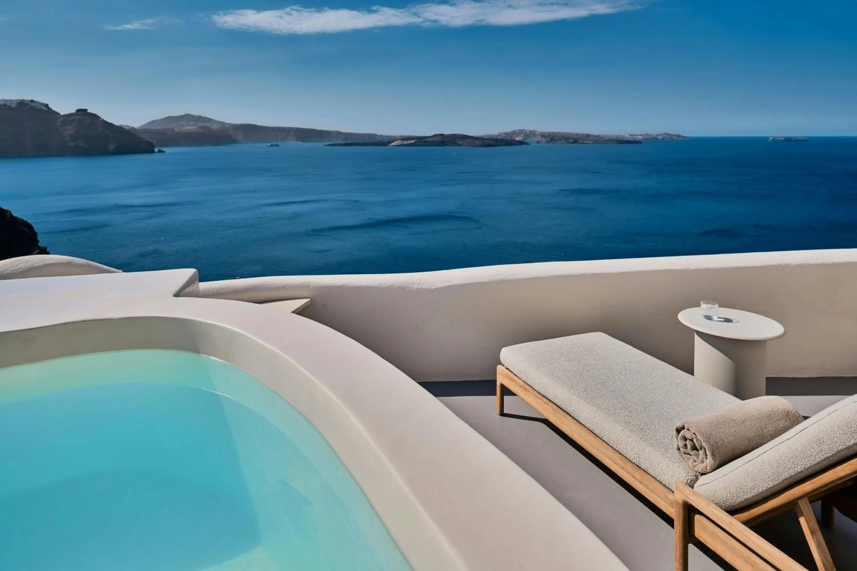 Photo of the whole room in Mystique, a Luxury Collection Hotel, Santorini