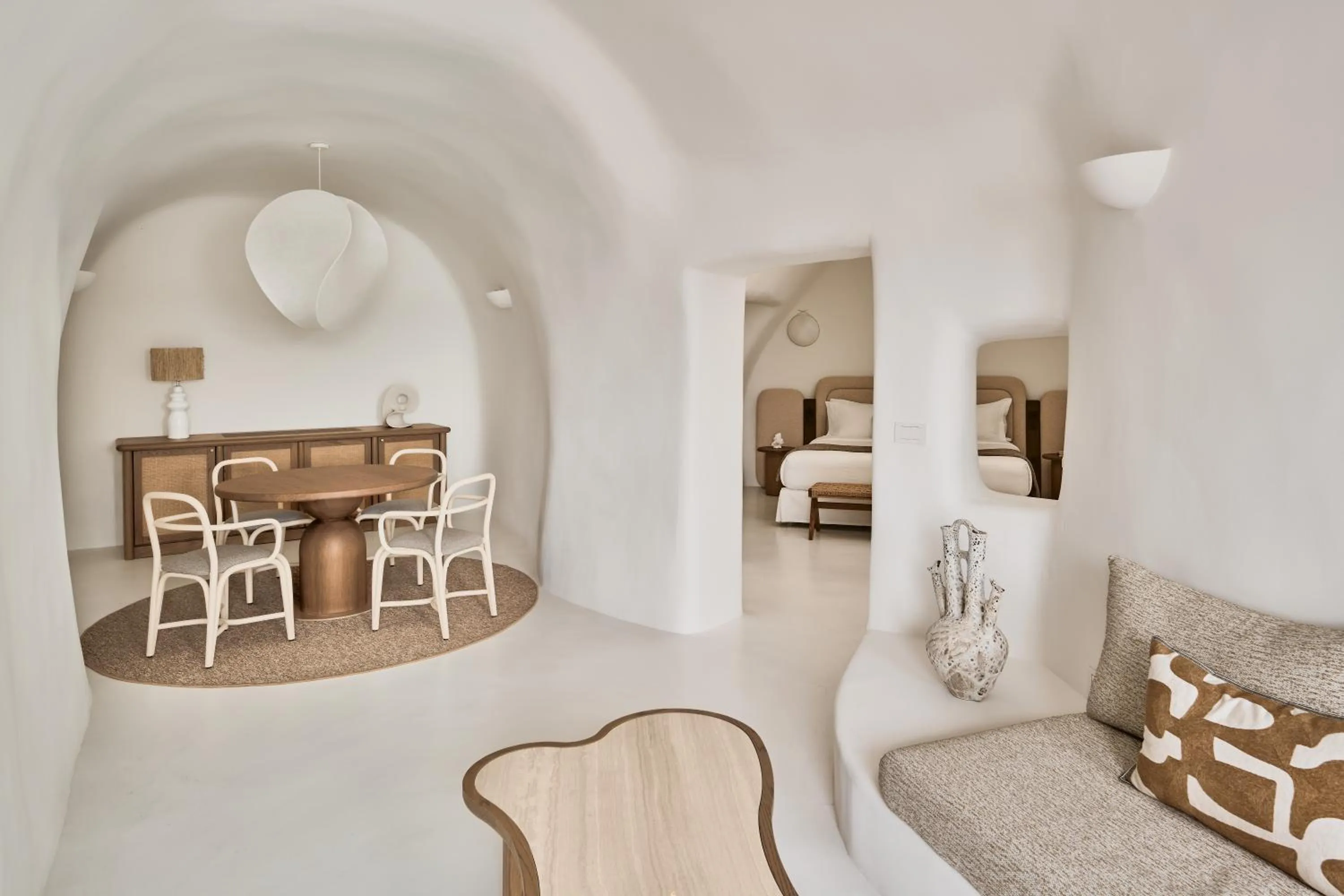 Living room, Bed in Mystique, a Luxury Collection Hotel, Santorini