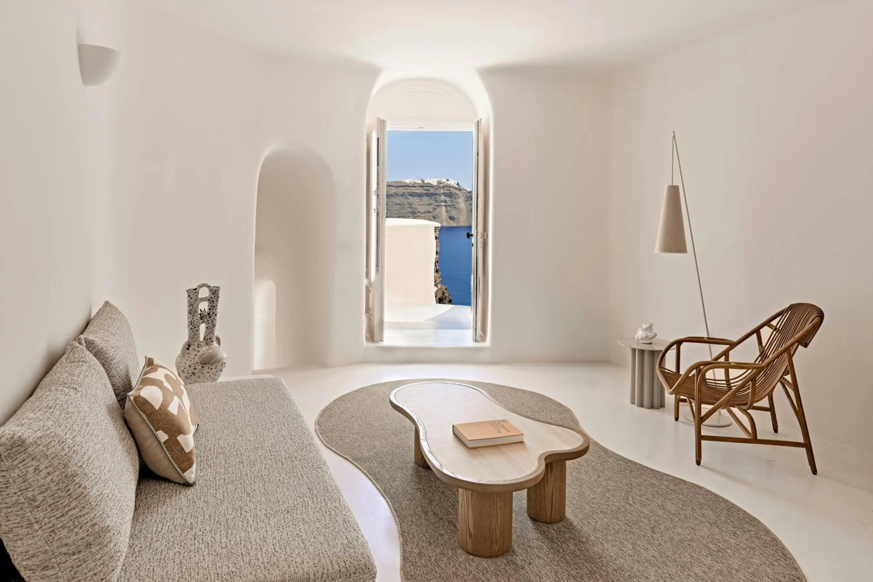 Photo of the whole room in Mystique, a Luxury Collection Hotel, Santorini