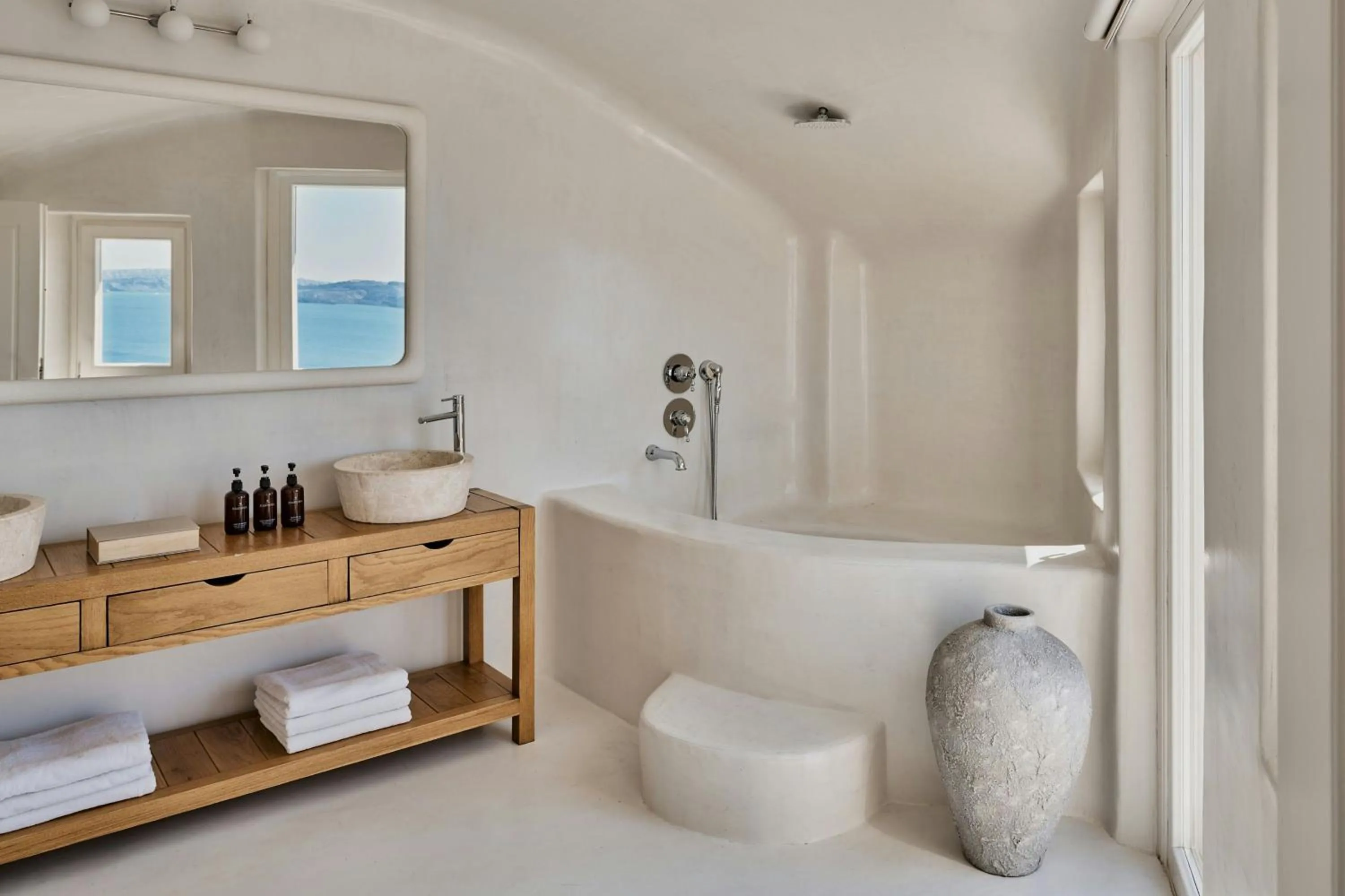 Photo of the whole room in Mystique, a Luxury Collection Hotel, Santorini
