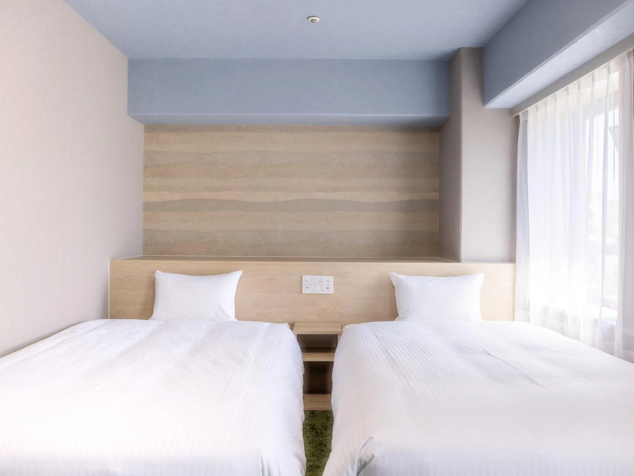 Photo of the whole room, Bed in KOKO HOTEL Shizuoka - formerly Hotel Wing International Shizuoka