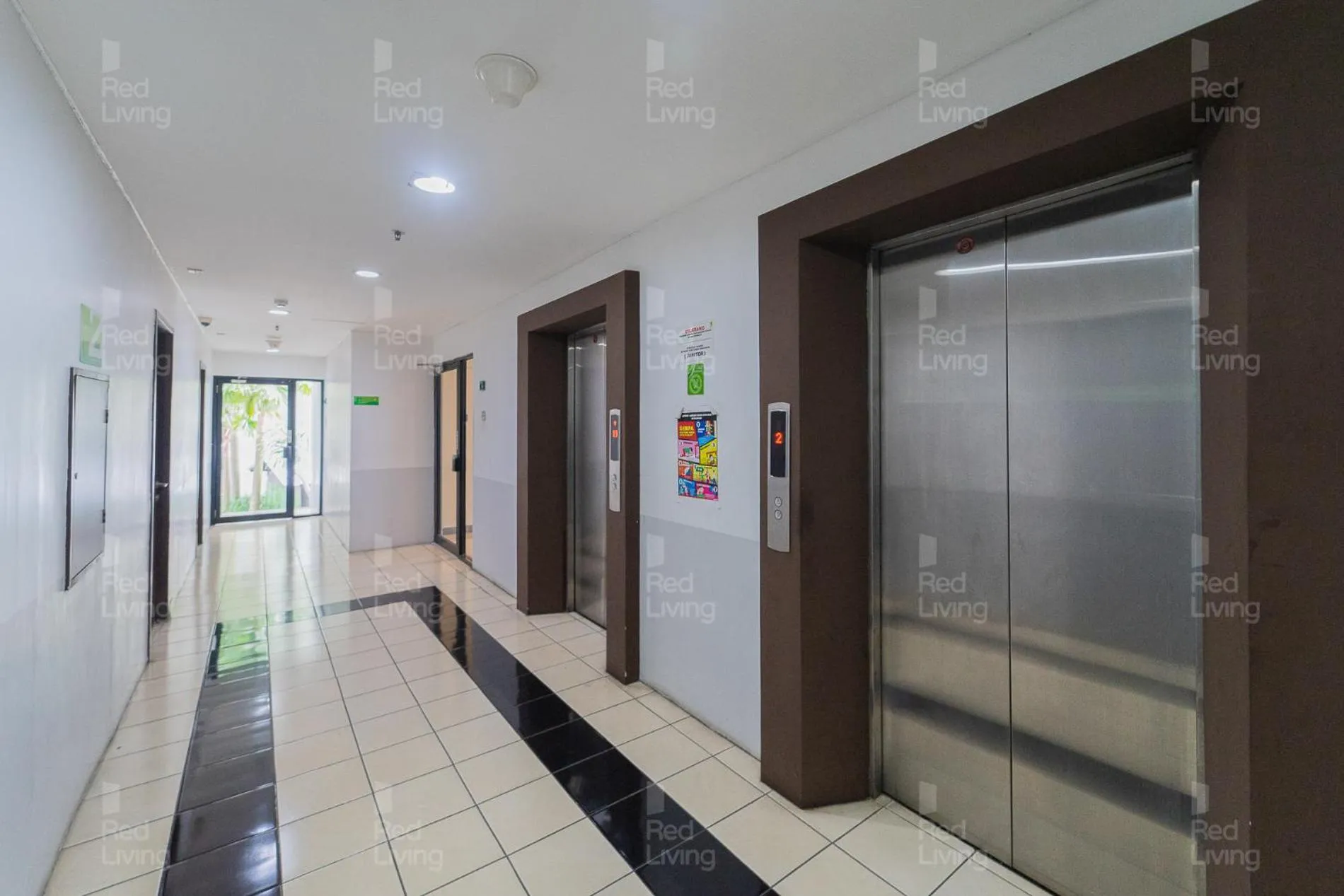 elevator in RedLiving Apartemen Serpong Green View - Nawawih Room Tower B