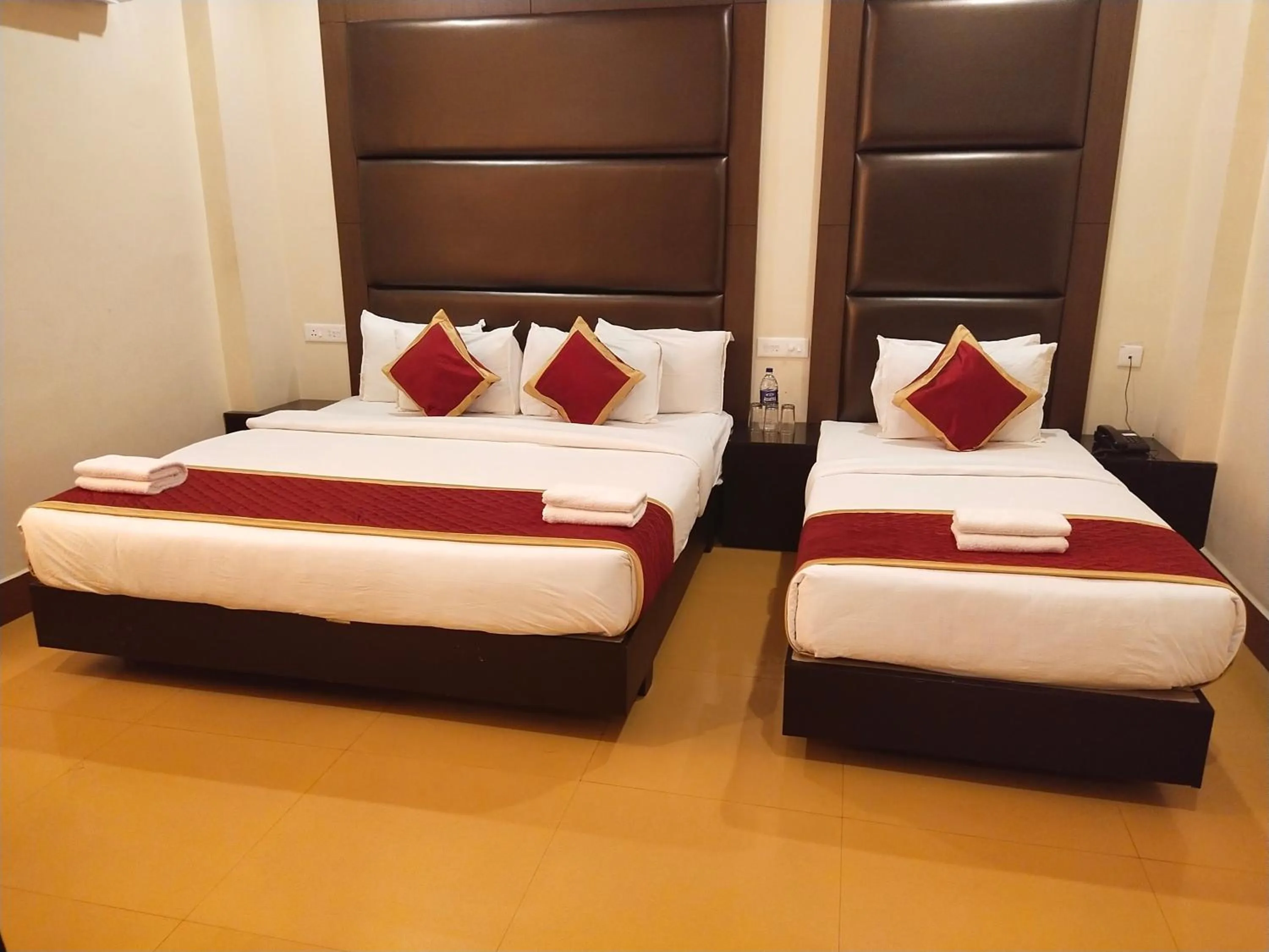 Bed in HOTEL PIONEER PARADISE