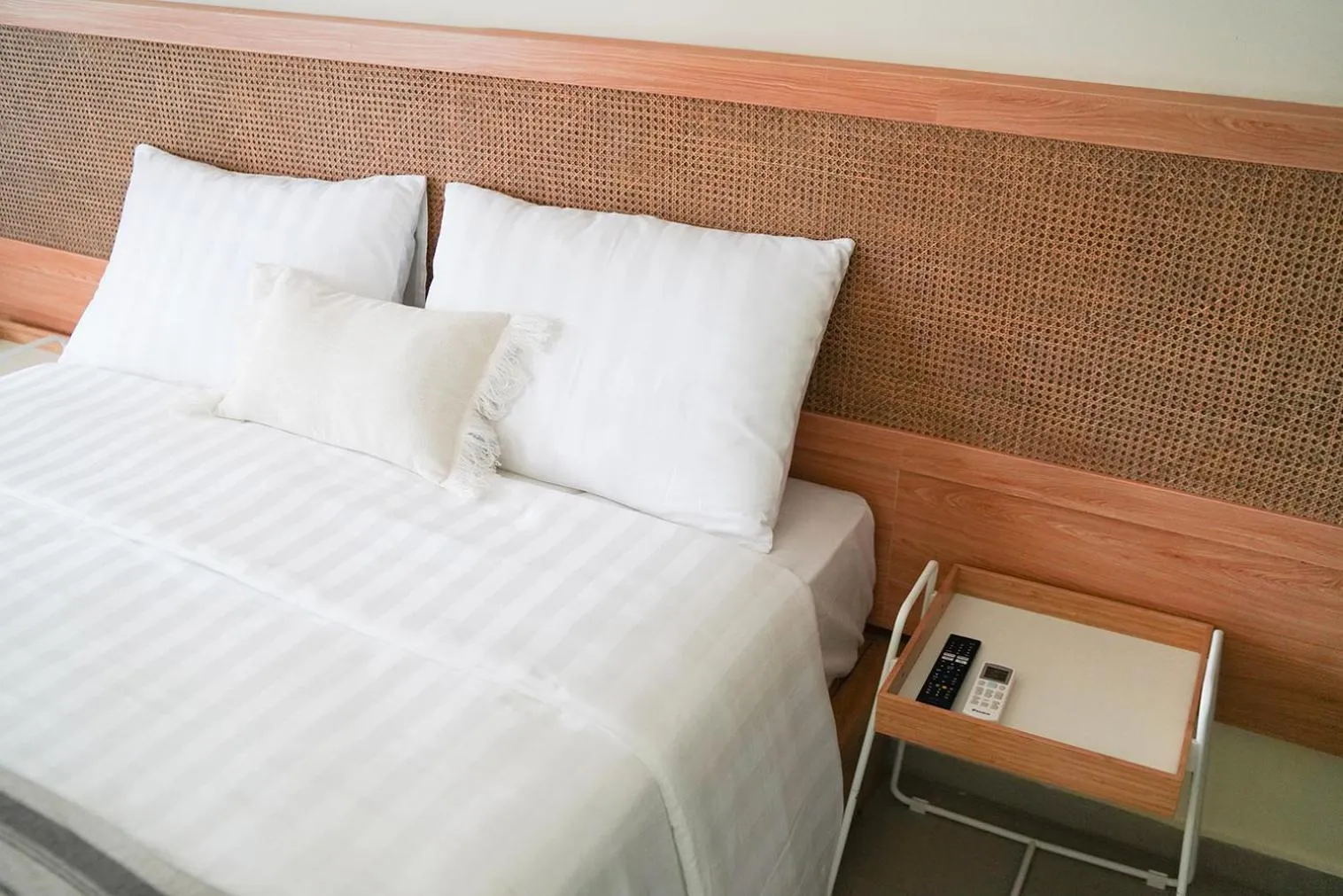 Bed in Roots Hotel Senggigi