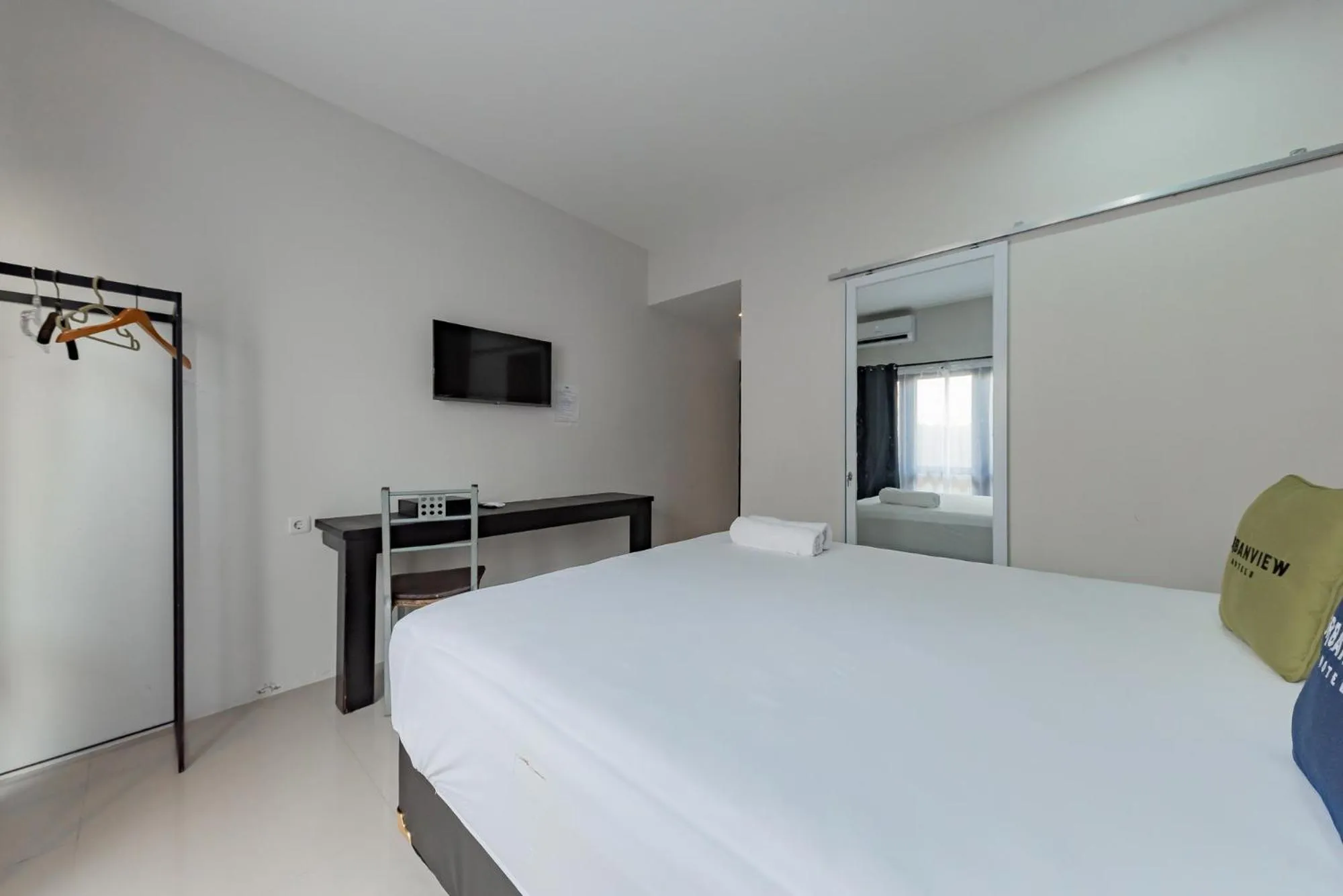 Bed in Urbanview Hotel Yoga Palangkaraya by RedDoorz