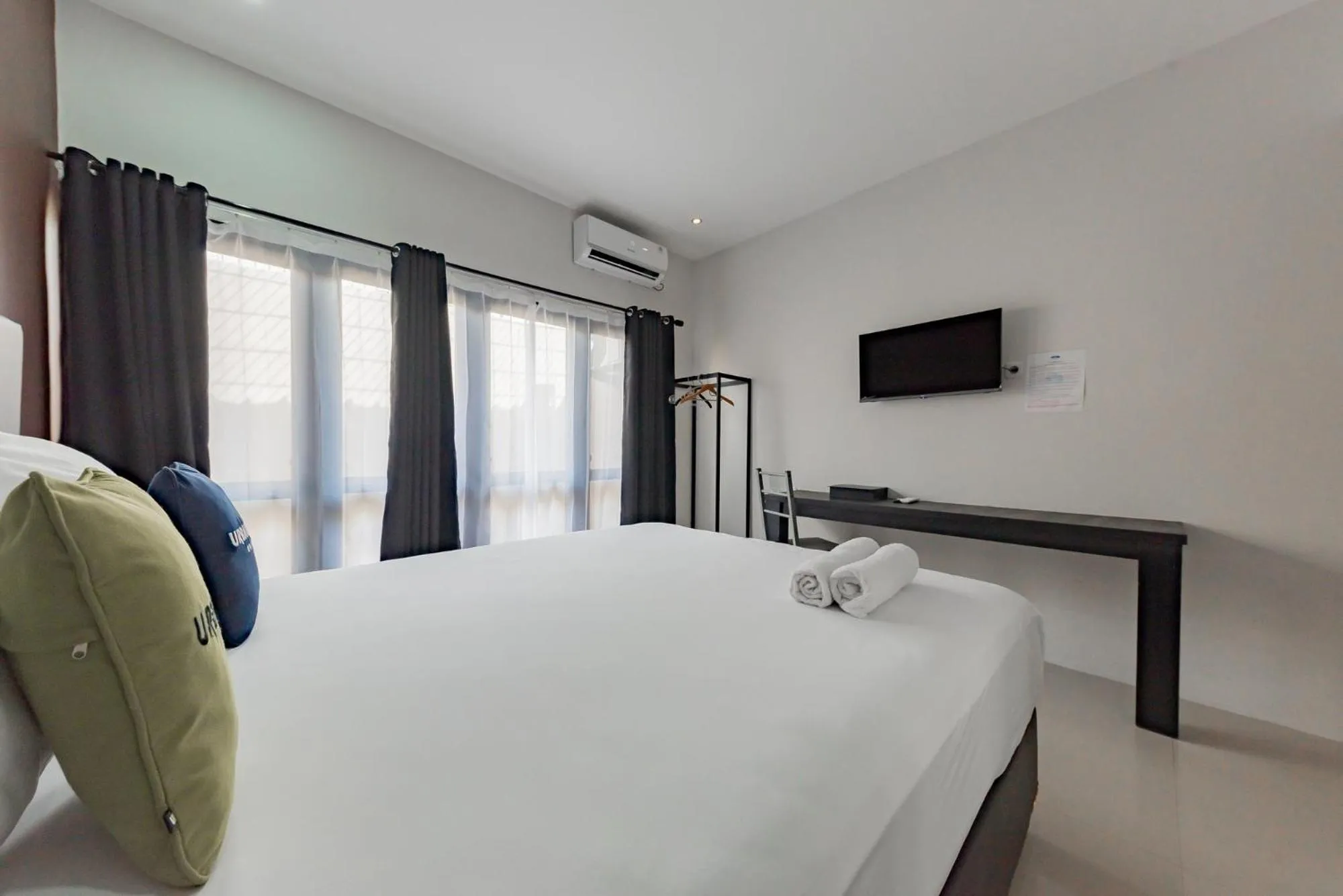 Bed in Urbanview Hotel Yoga Palangkaraya by RedDoorz