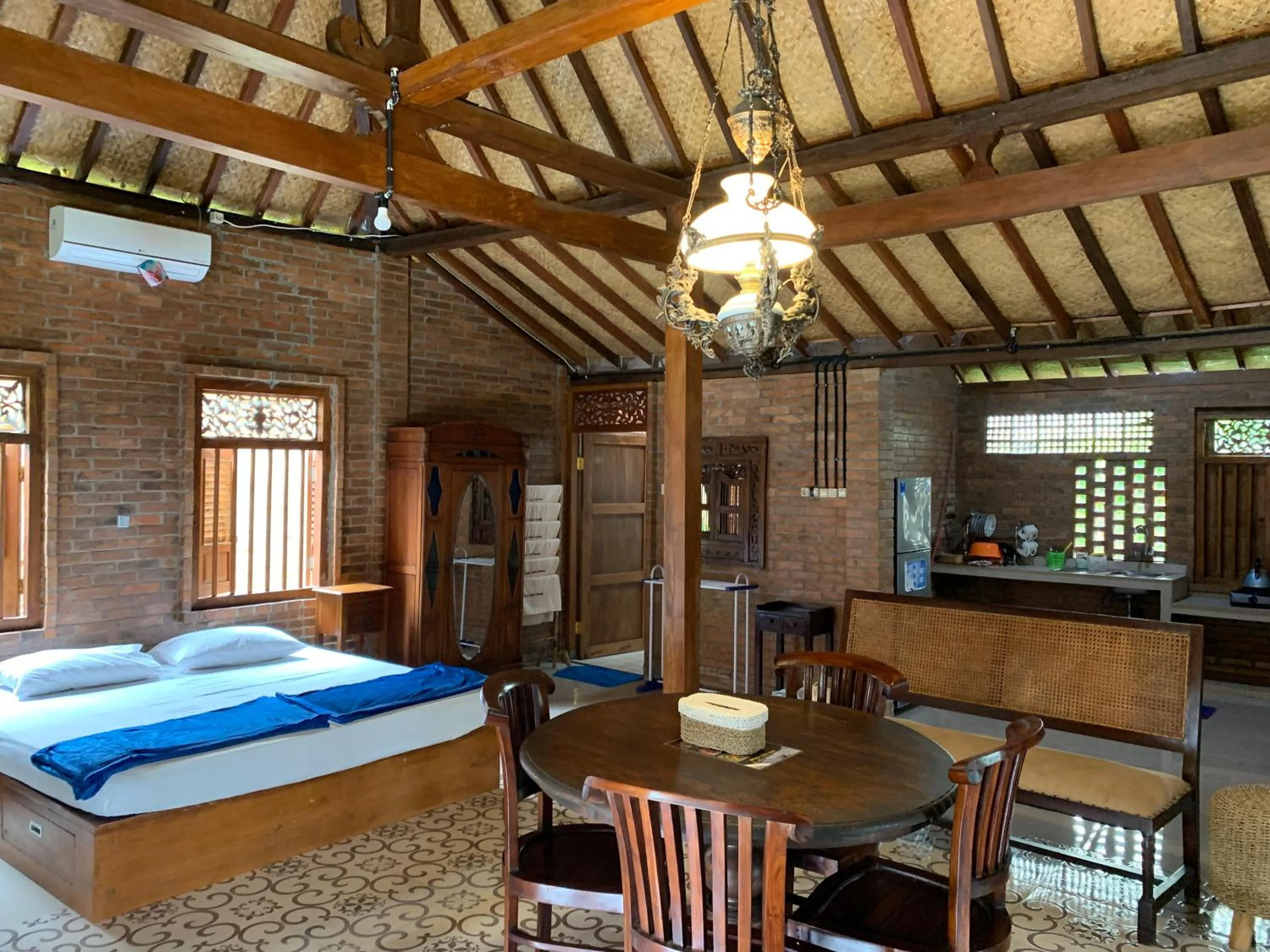 Bedroom in Omah Mbah Mandor by The Lavana