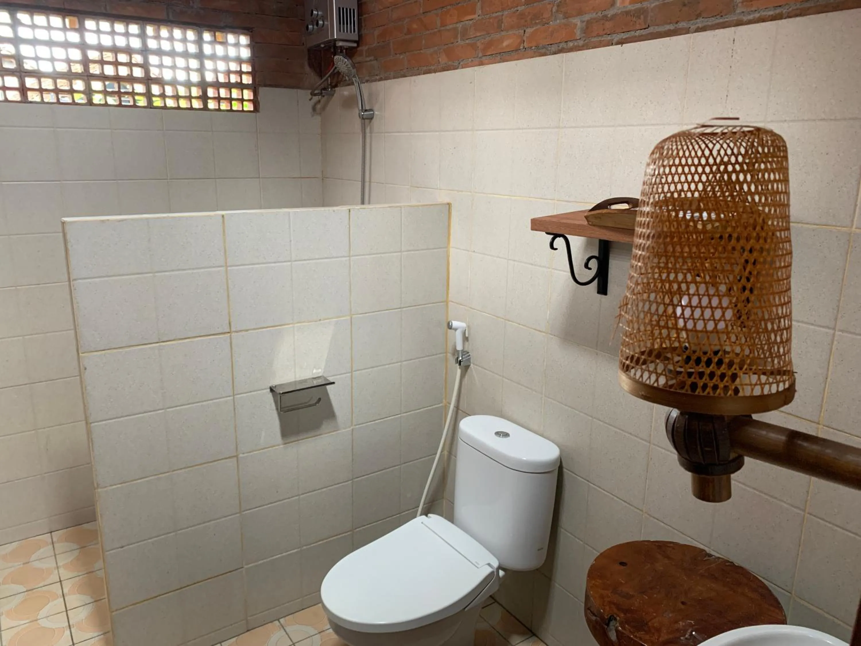 Bathroom in Omah Mbah Mandor by The Lavana