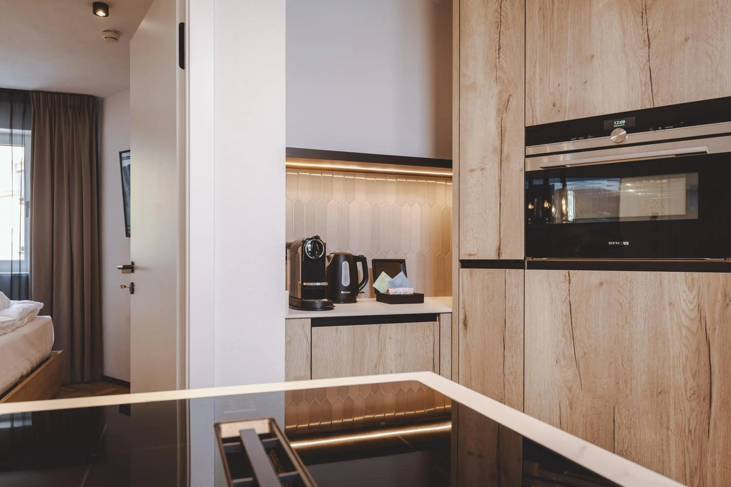 kitchen, Bed in The Gast House Zell am See