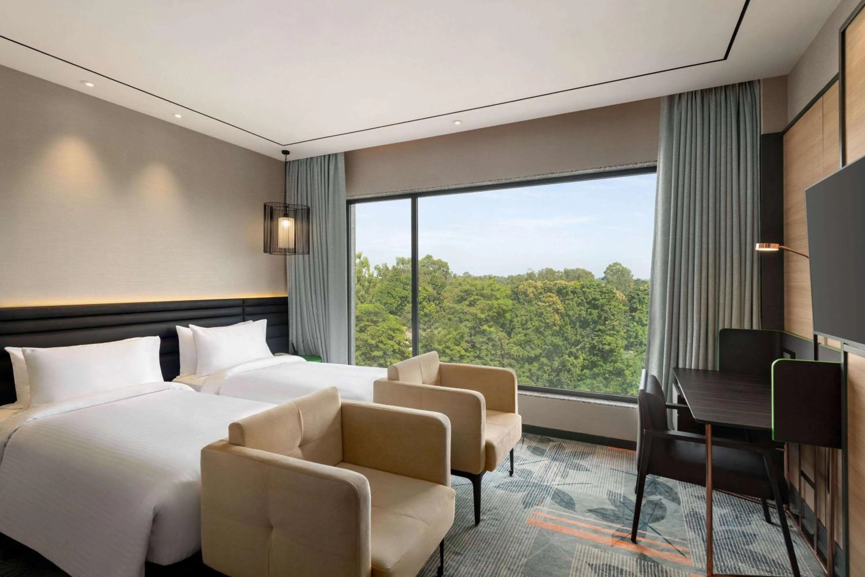 Photo of the whole room, Bed in Ramada Encore by Wyndham Bareilly Civil Lines