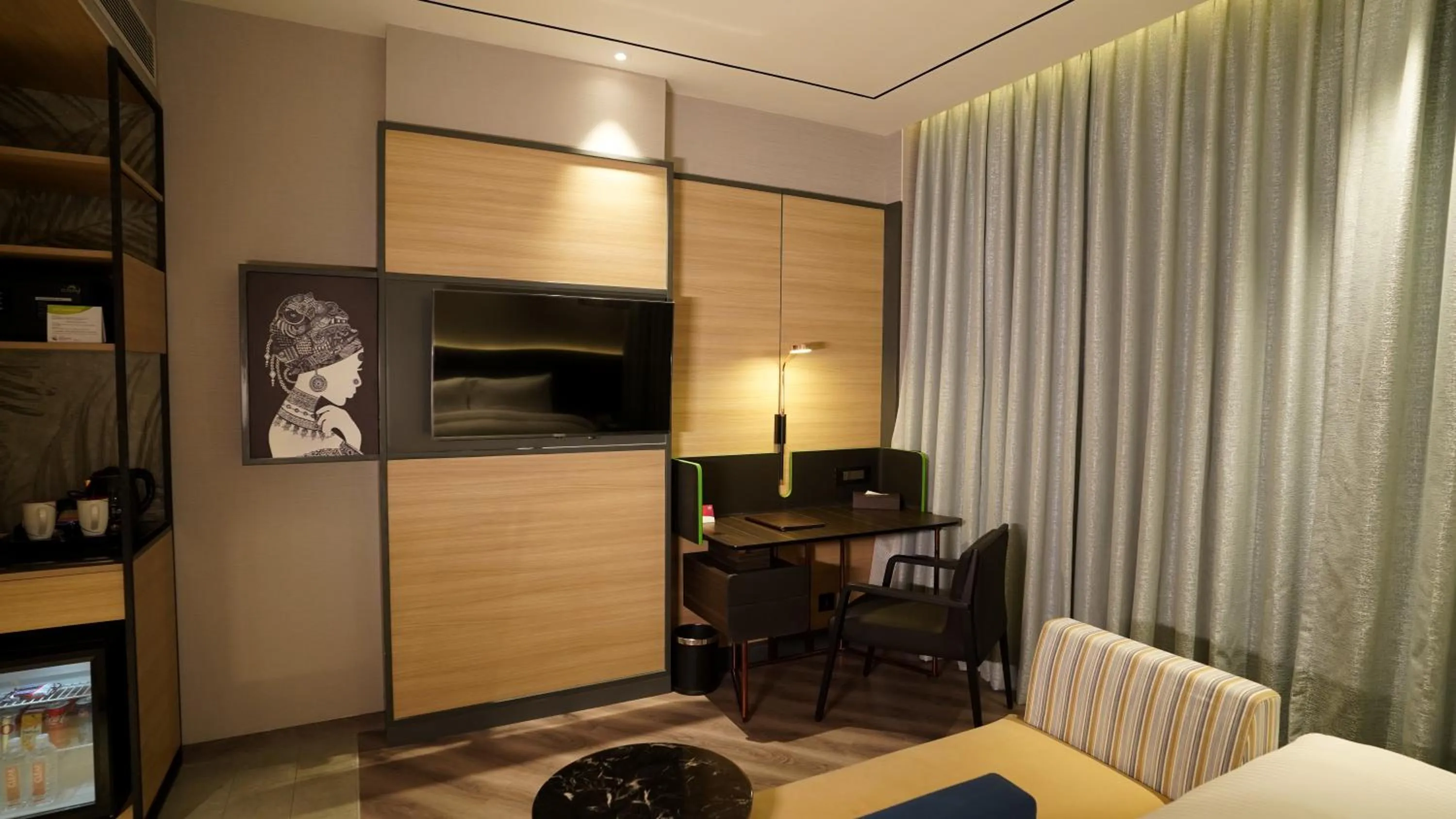 Communal lounge/ TV room in Ramada Encore by Wyndham Bareilly Civil Lines