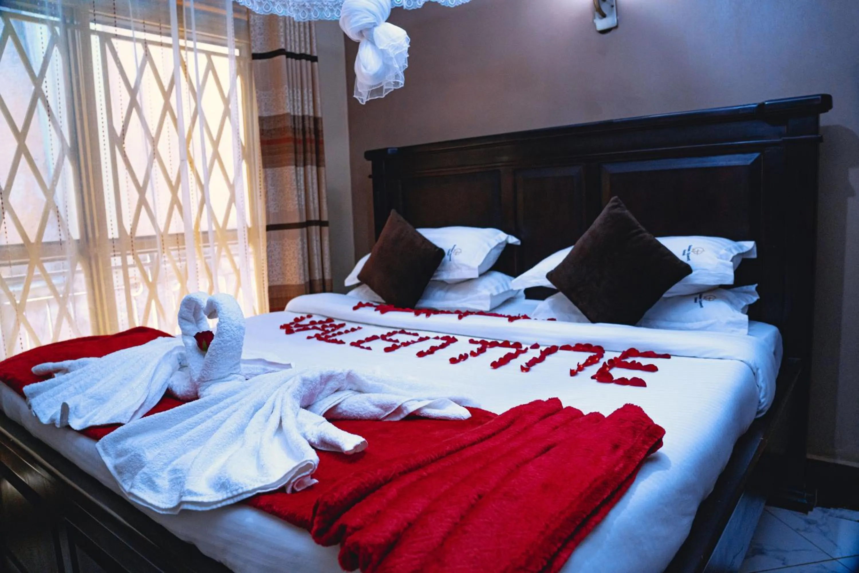 Bed in GOLDEN QUEST HOTEL