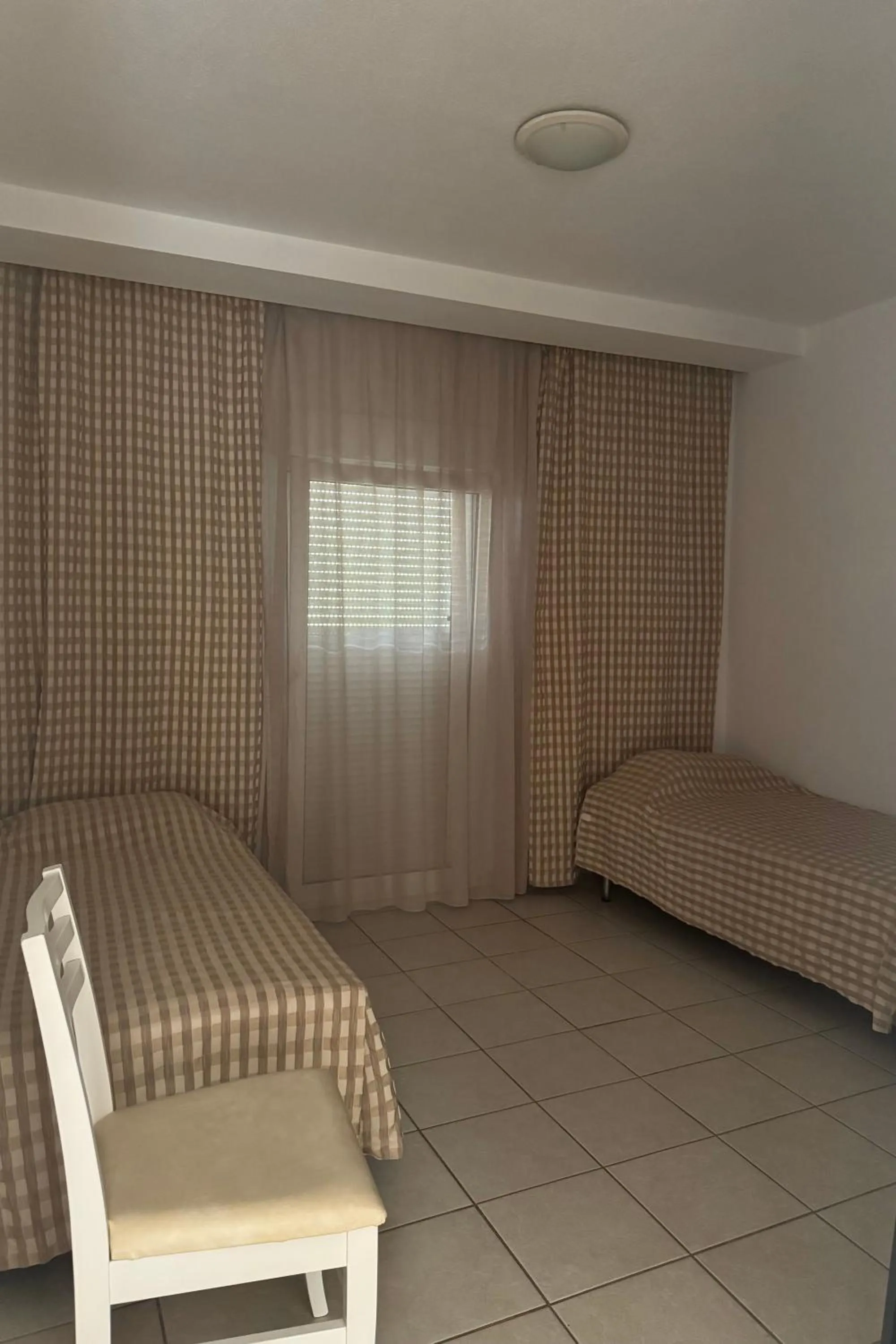 Bed in Milos Apartments