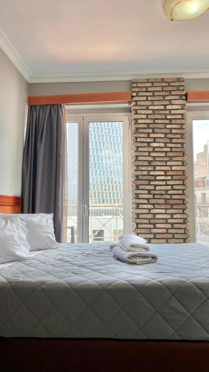 Photo of the whole room, Bed in Piraeus Acropole Hotel