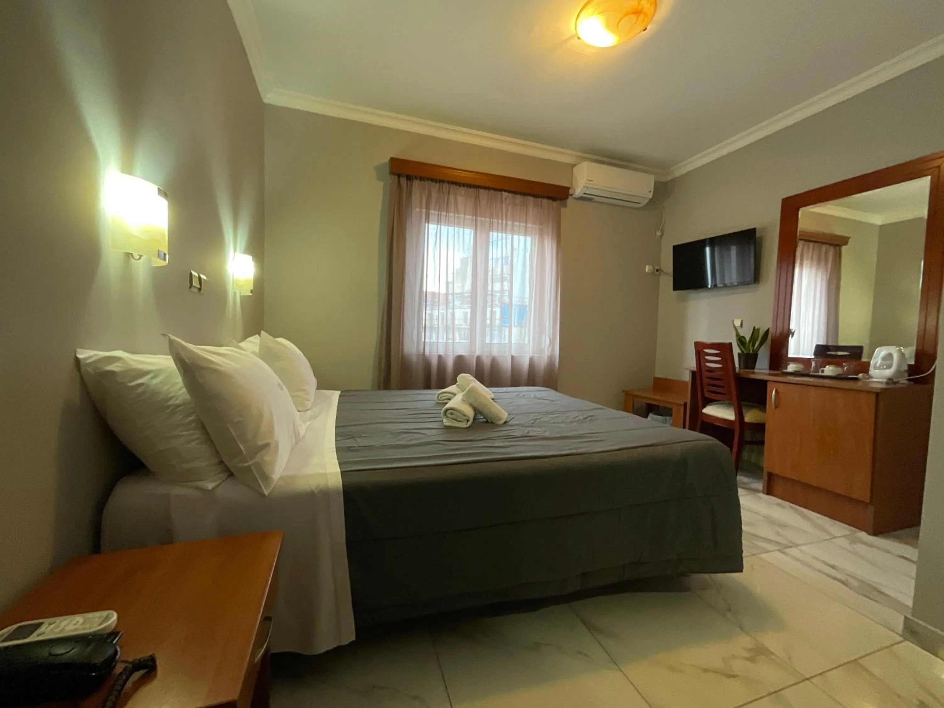 Photo of the whole room, Bed in Piraeus Acropole Hotel