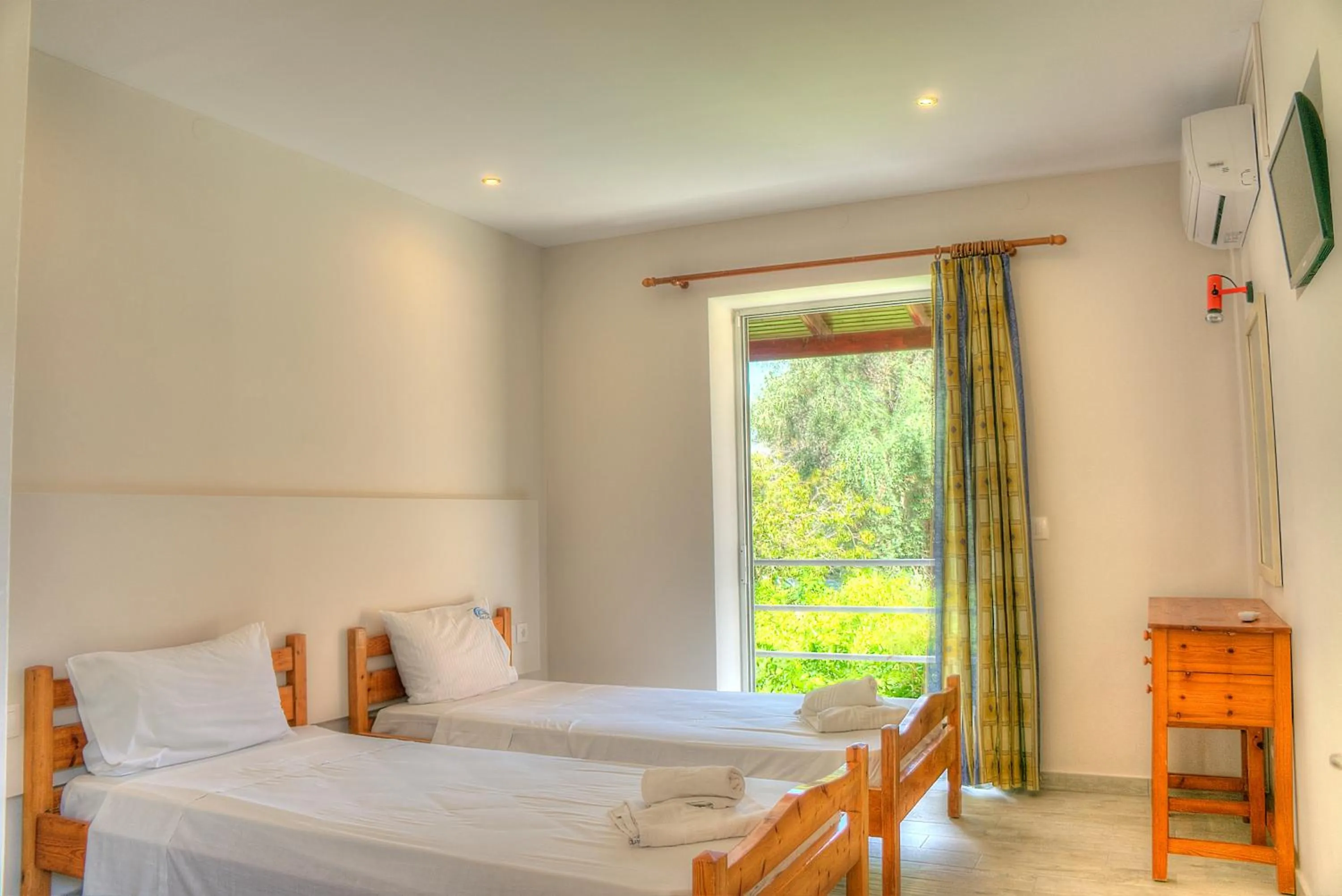 Bedroom in Hotel Benitses Arches