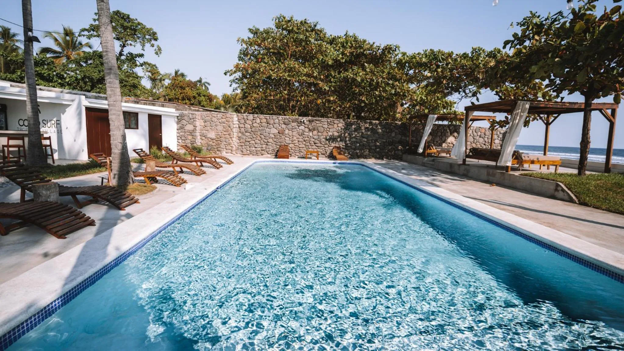 Swimming pool in Coco Surf Tropical Village