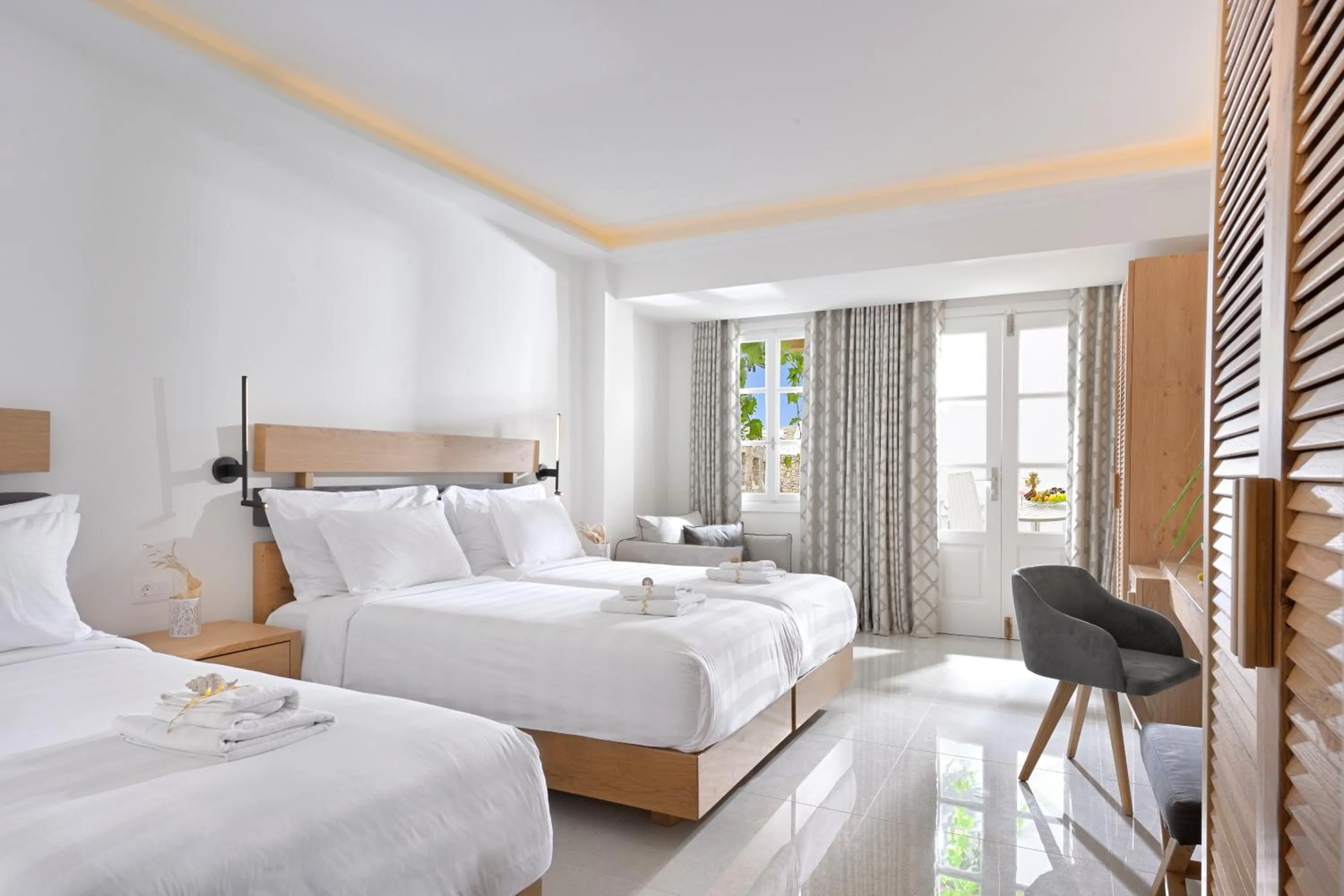 Bed in Petinos Hotel