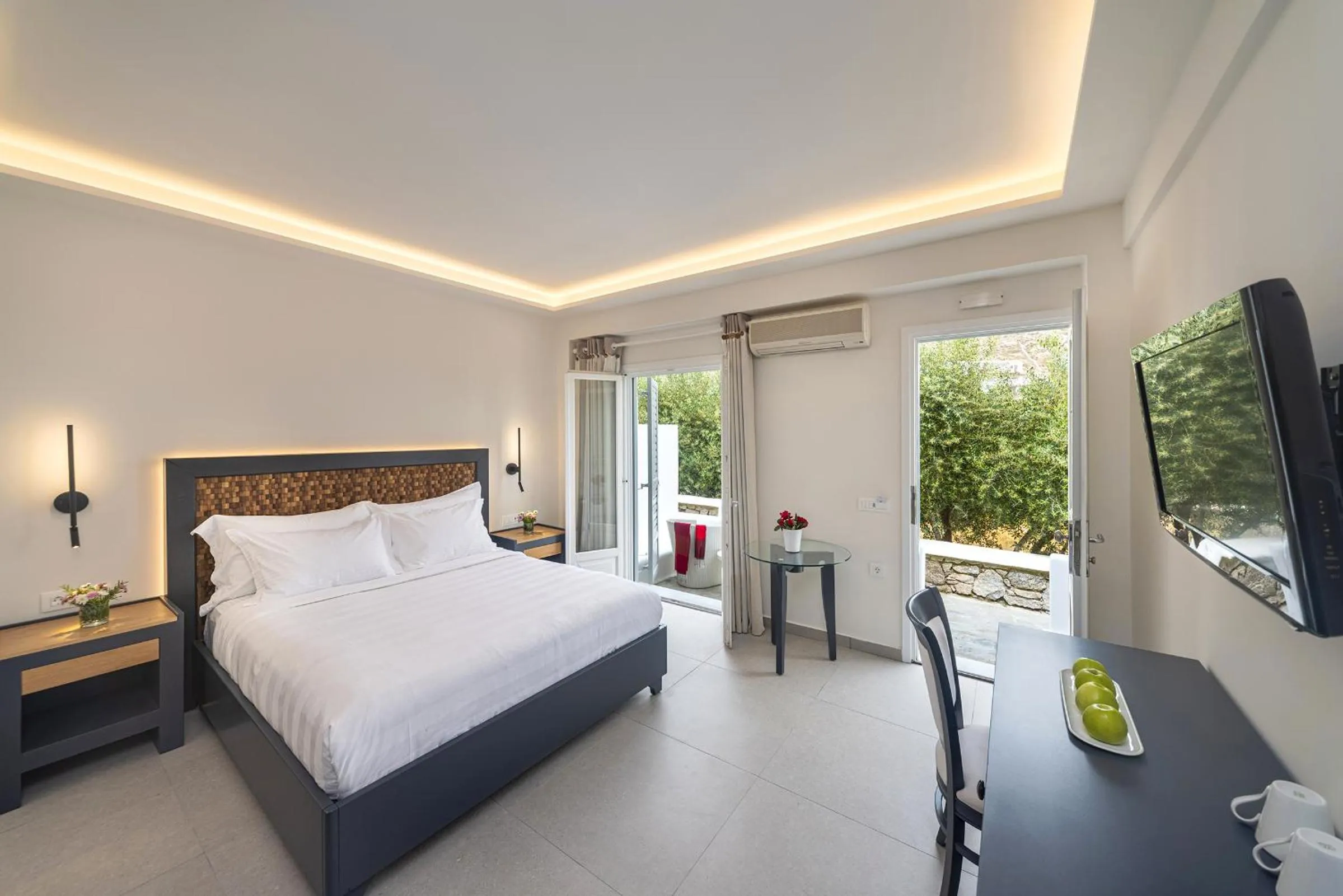 Bed in Petinos Hotel