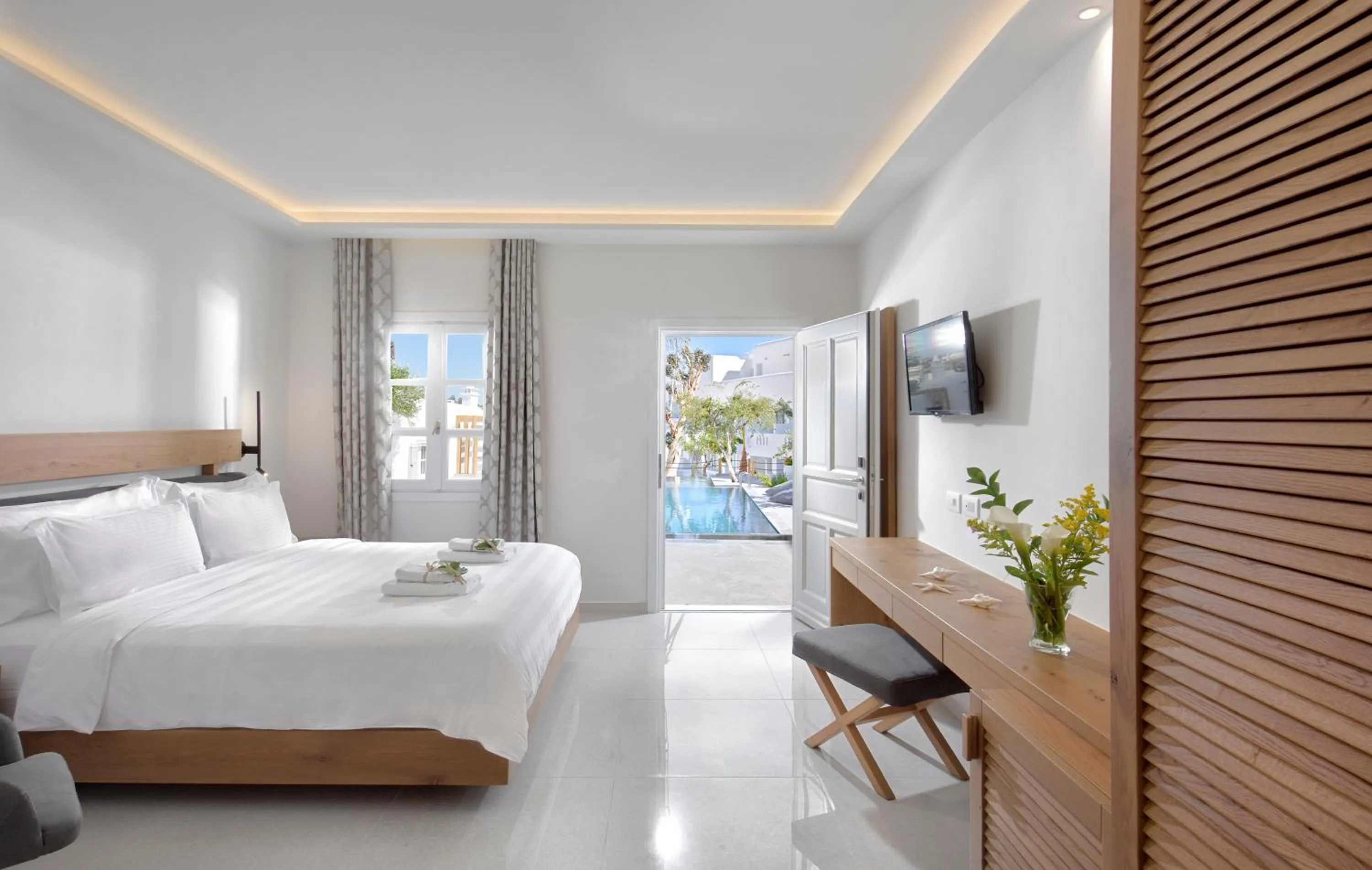 Bed in Petinos Hotel