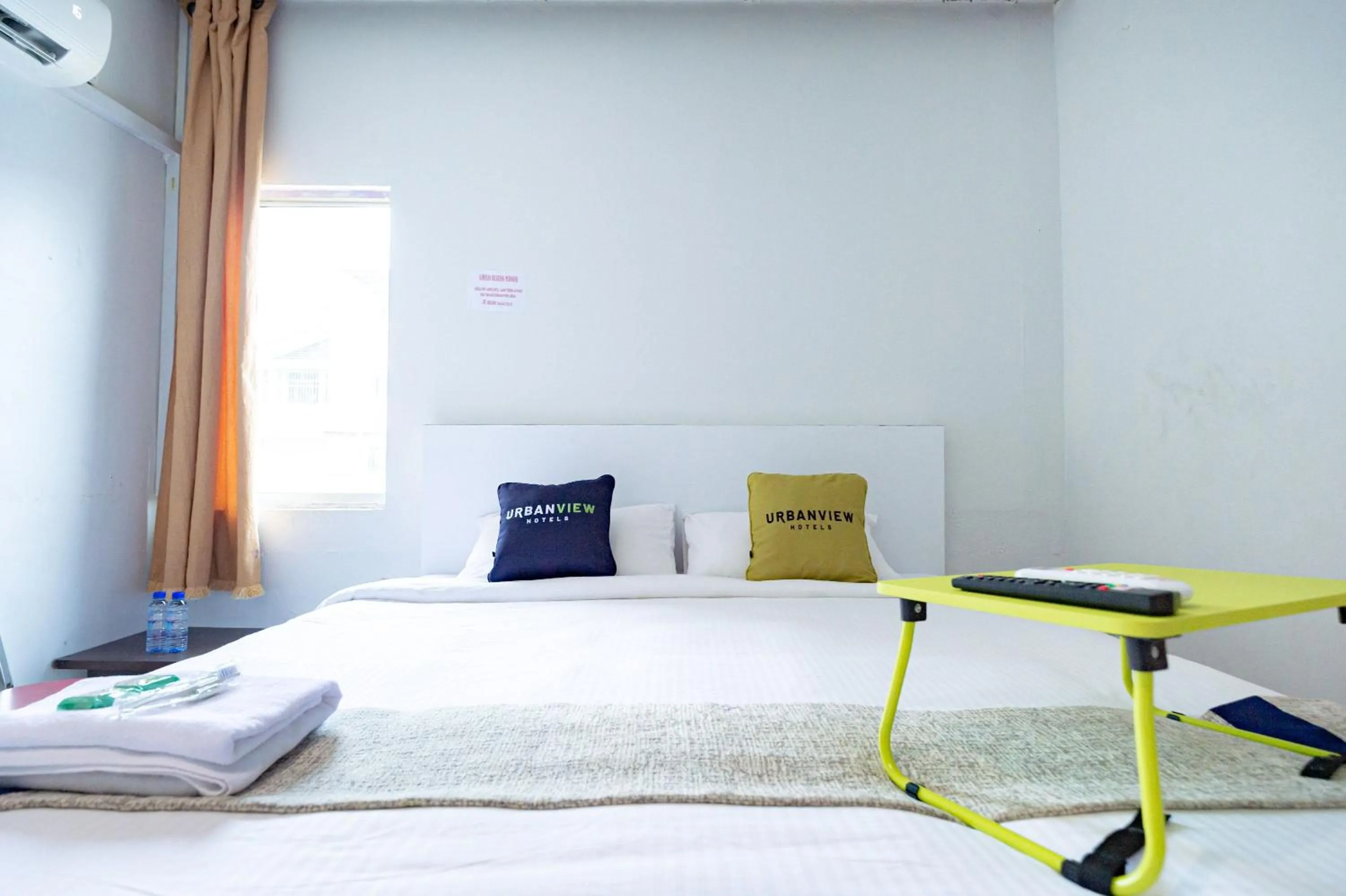 Bedroom, Bed in Urbanview Hotel Crystal Nagoya Batam by RedDoorz