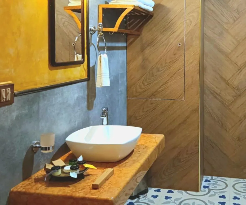 Shower in Marari Beach Bungalow Resort Alleppey