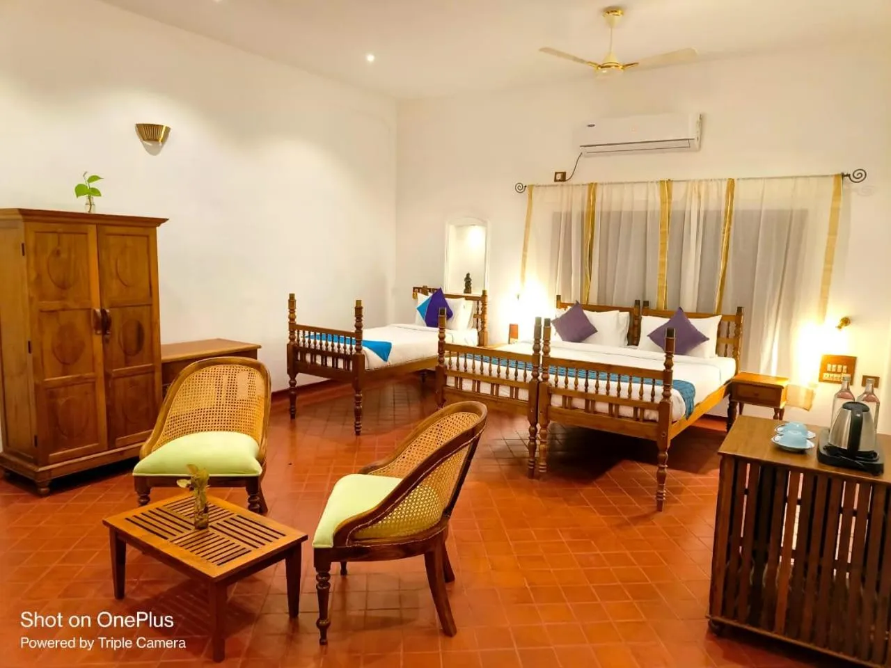 Bed in Marari Beach Bungalow Resort Alleppey