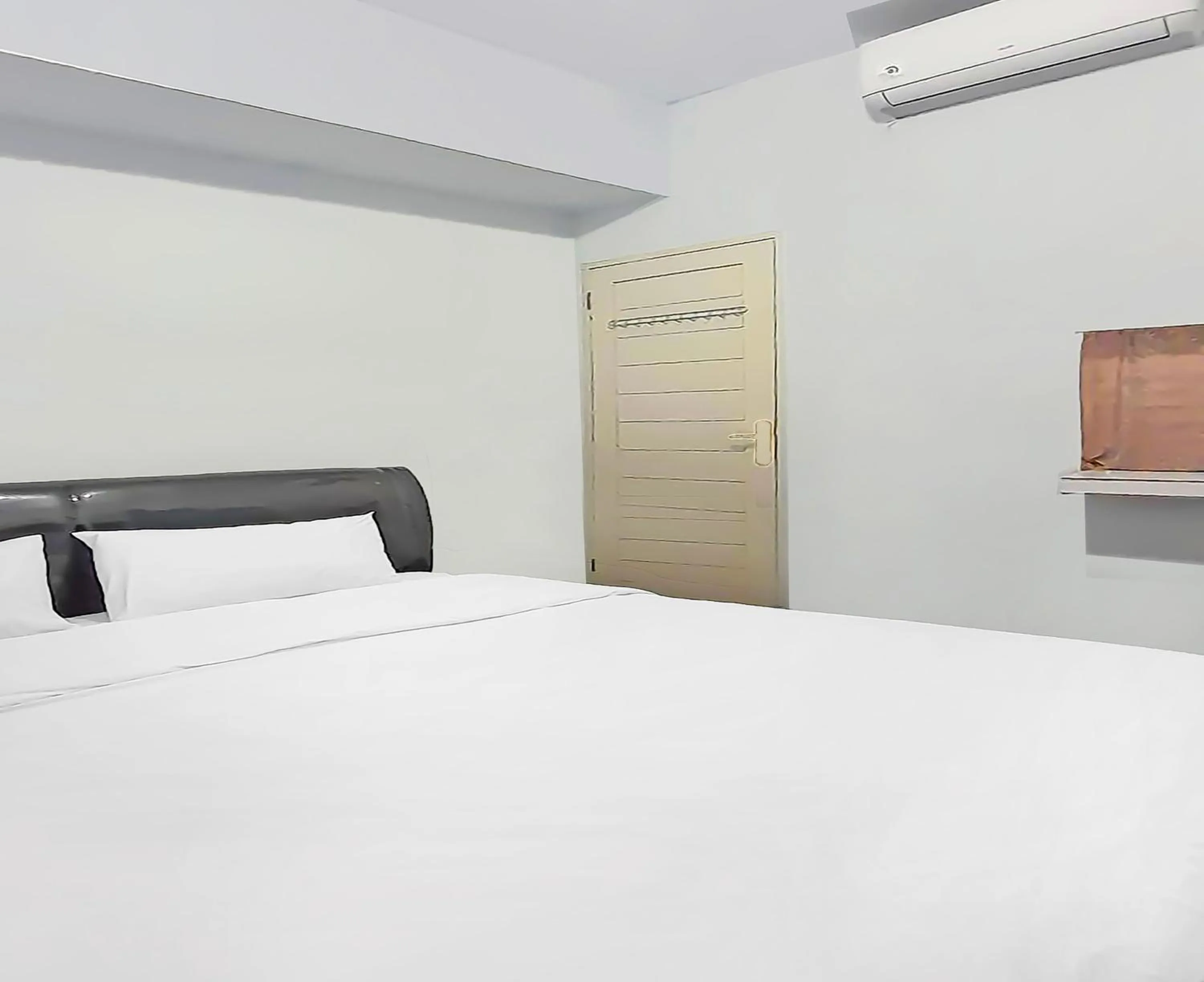 Bedroom, Bed in SPOT ON 92236 Kediri Family Homestay