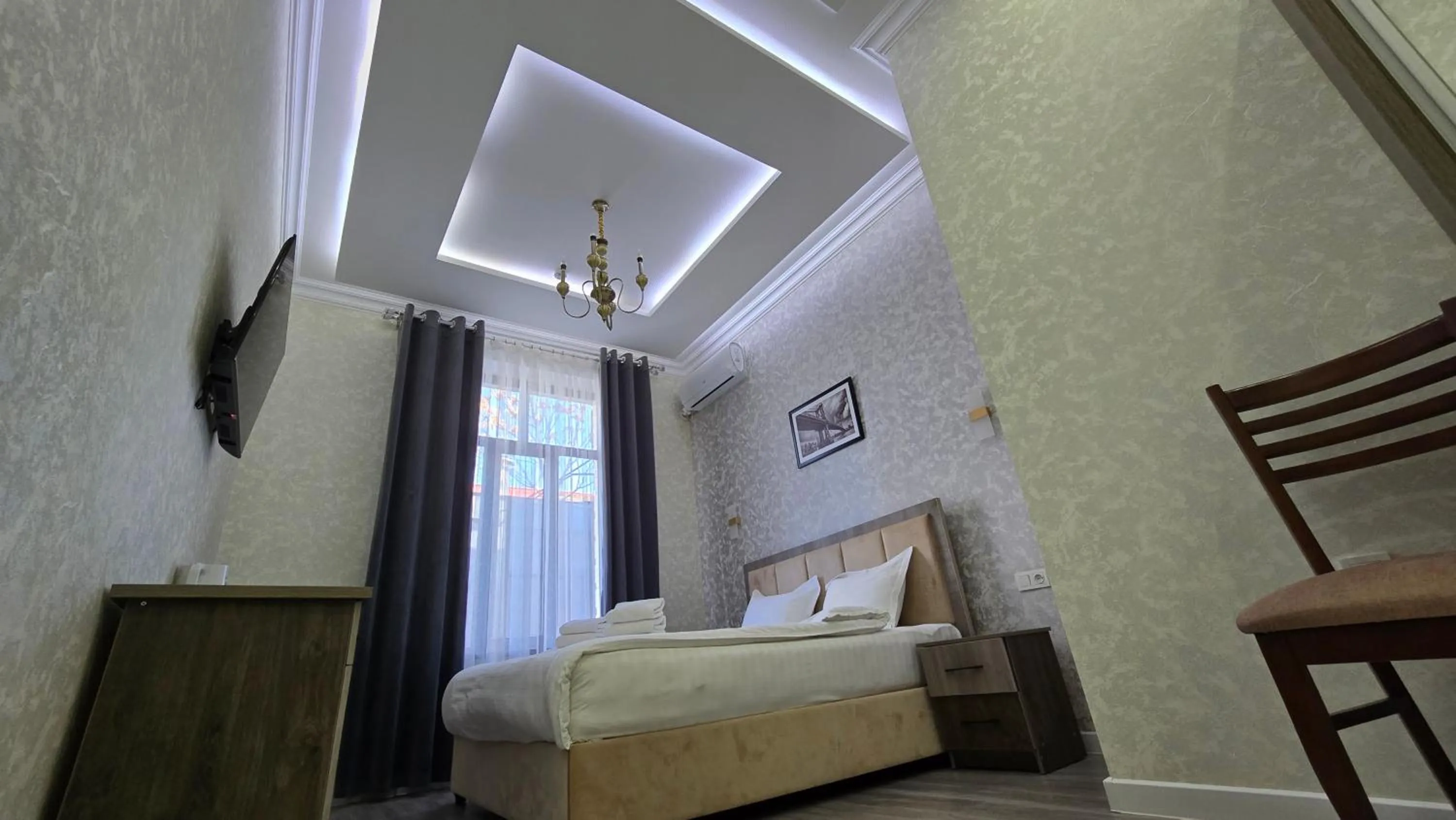 Bed in OLD STATION HOTEL