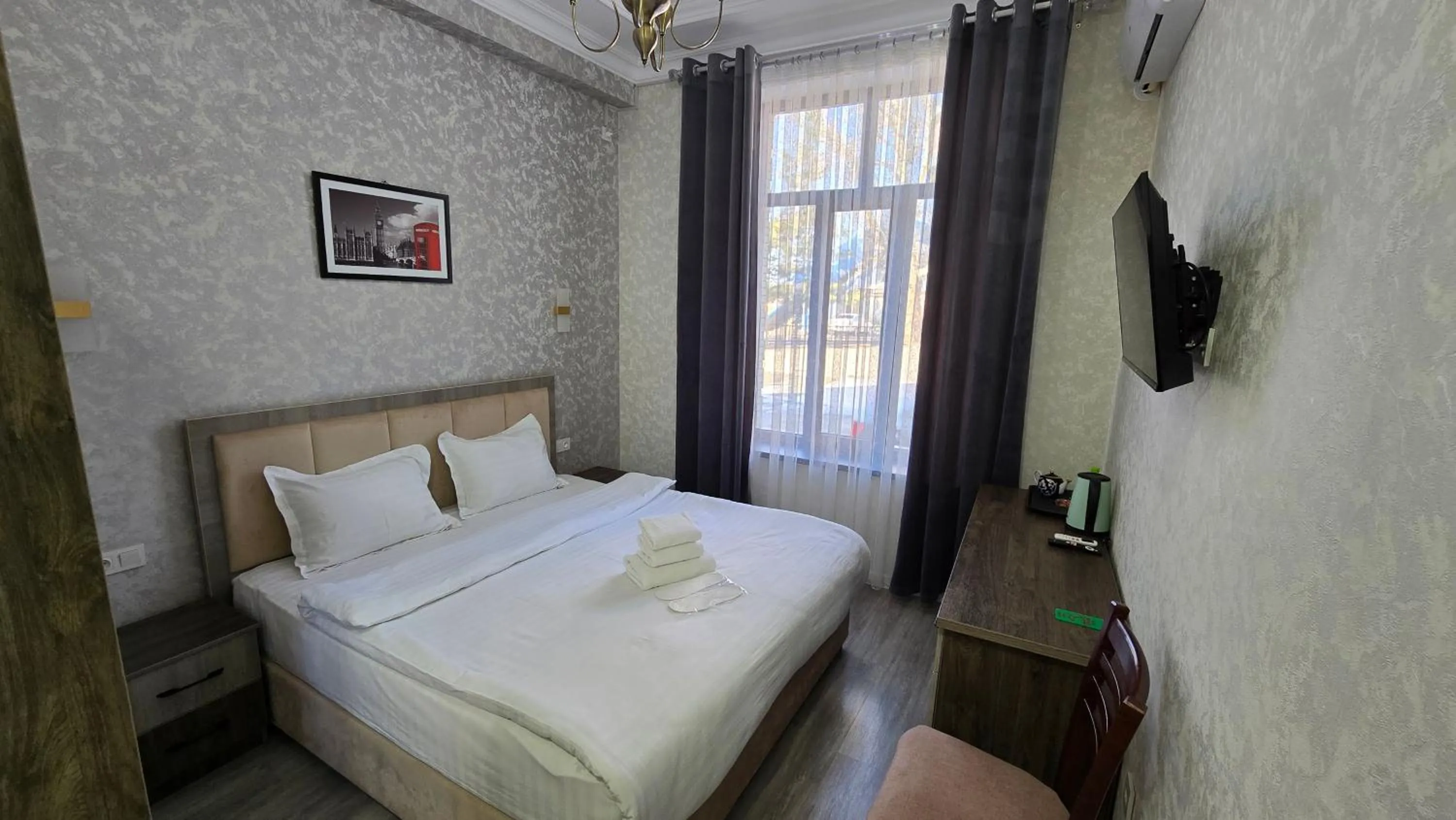 Bed in OLD STATION HOTEL