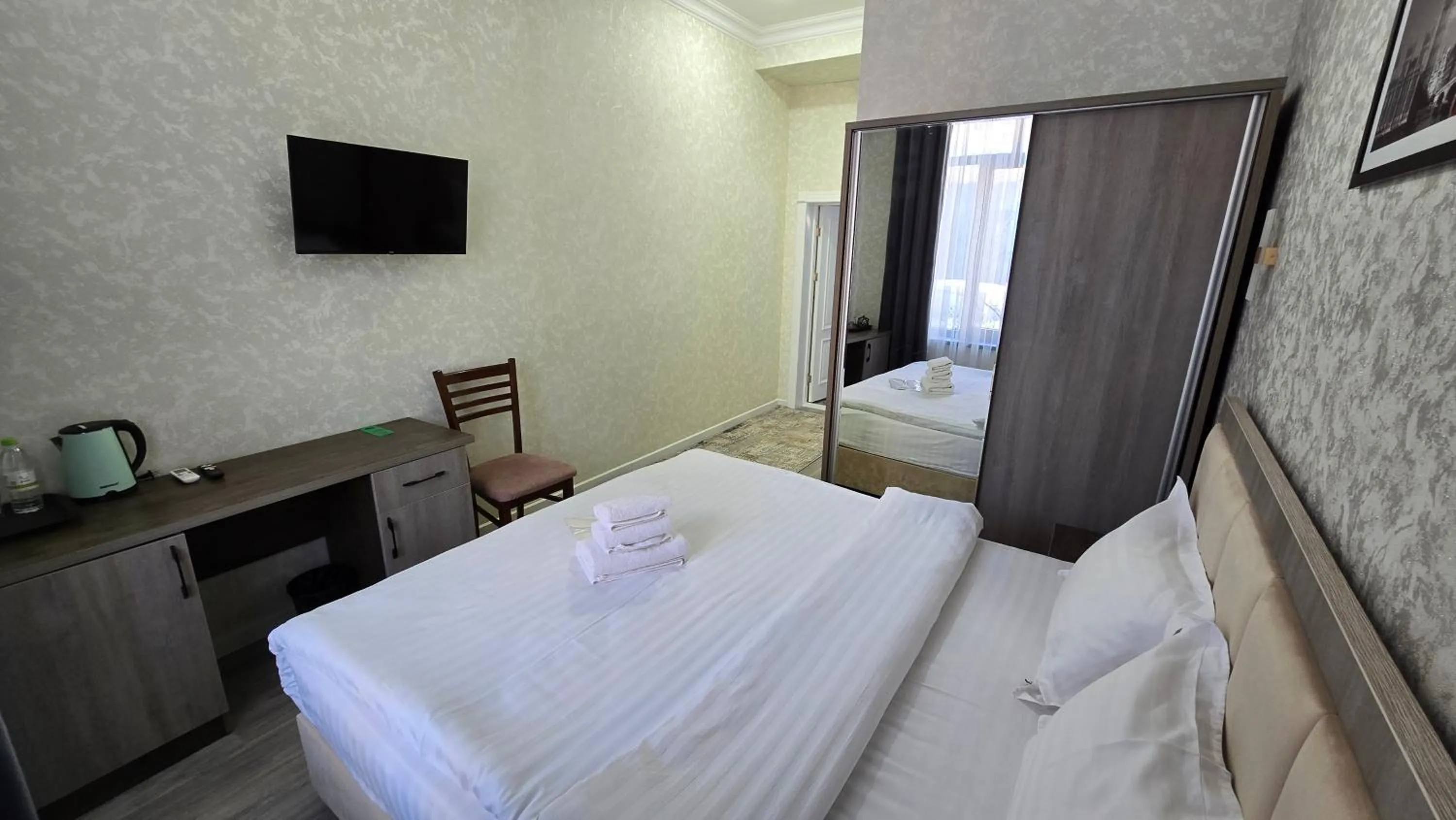 Bed in OLD STATION HOTEL